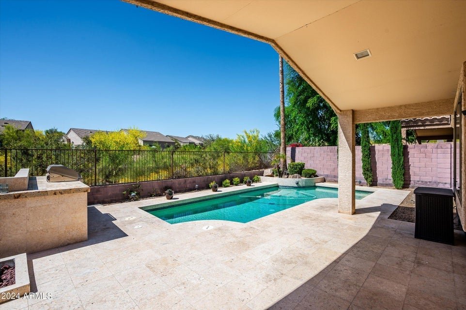 #JustListed Single level home with a pool in Ironwood Village, North Scottsdale. Throughout the home, you'll find travertine and walnut hardwood flooring, complemented by cherry cabinets, granite slab kitchen countertops, stainless steel refrigerator