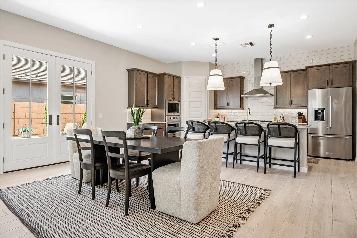 #NewListing #ForLease #Unfurnished Gorgeous single-level home in the highly desired Talinn at Desert Ridge community. Built in 2023, this unfurnished rental (12-month term) offers 4 bedrooms, 2 bathrooms, and an open entertainment floor plan with a n