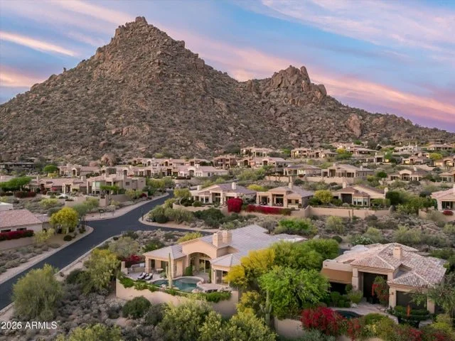 #JustListed Positioned on a premium corner lot, this stunning residence offers sweeping panoramic city light and mountain views from nearly every angle. Located in the highly sought-after community of Quail Ridge and surrounded by NAOS, the setting p