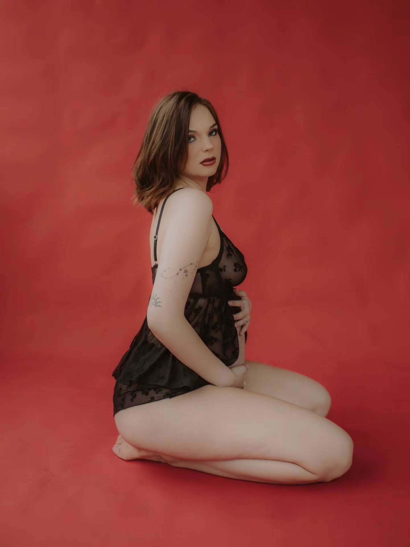 The journey of becoming a mother is sacred. You are growing a life, holding magic within.

Maternity boudoir is where softness meets strength, where your body is honored as both powerful and sensual. Your body is changing, expanding, becoming
not to 