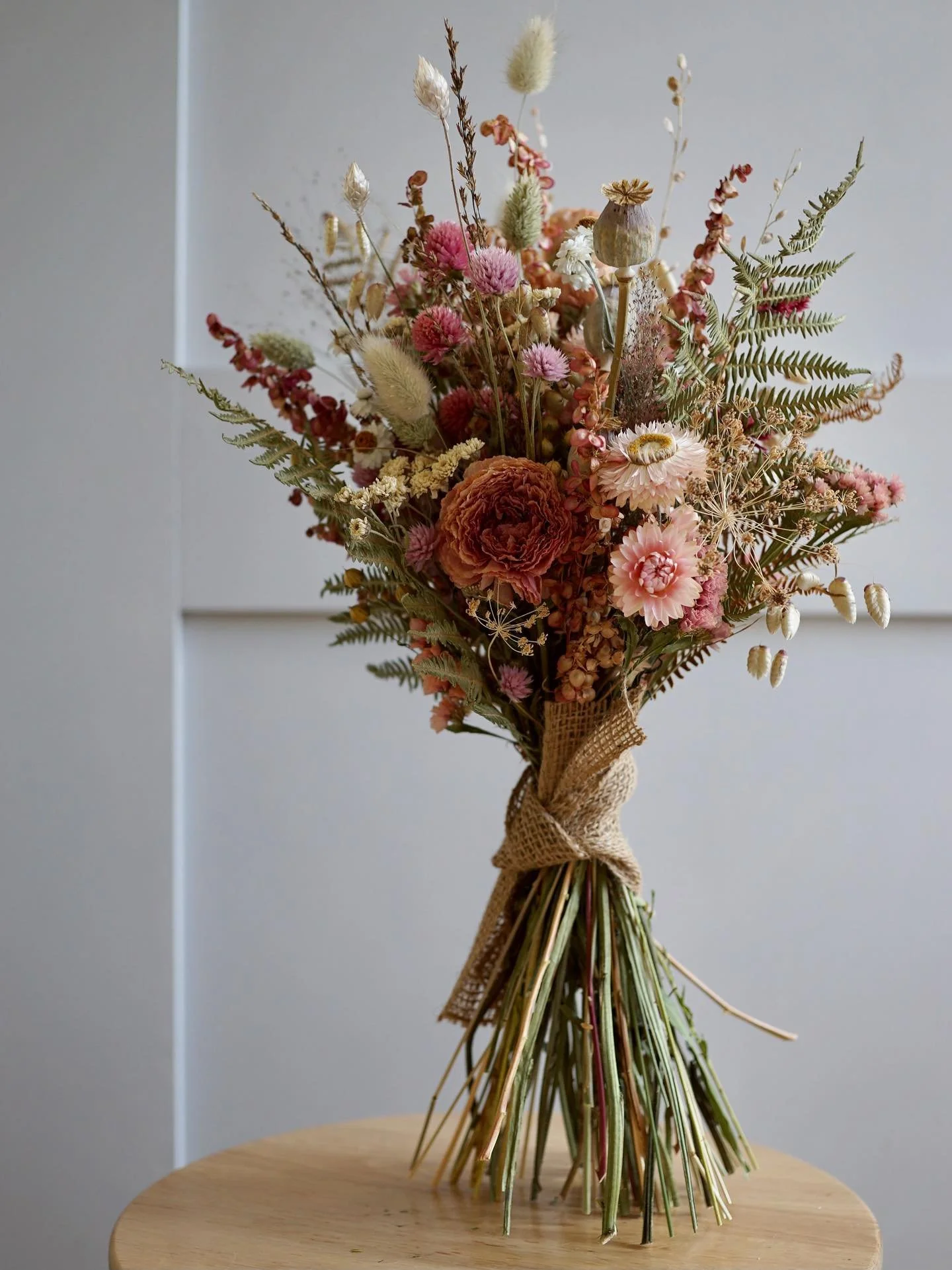 A pink dried flower bouquet with a little bit of autumnal warmth from apricot colours 🧡 Sent out yesterday to its new home (send a message or visit my website to request your own bespoke bouquet 🌸)

What are you up to this weekend? I&rsquo;m contin