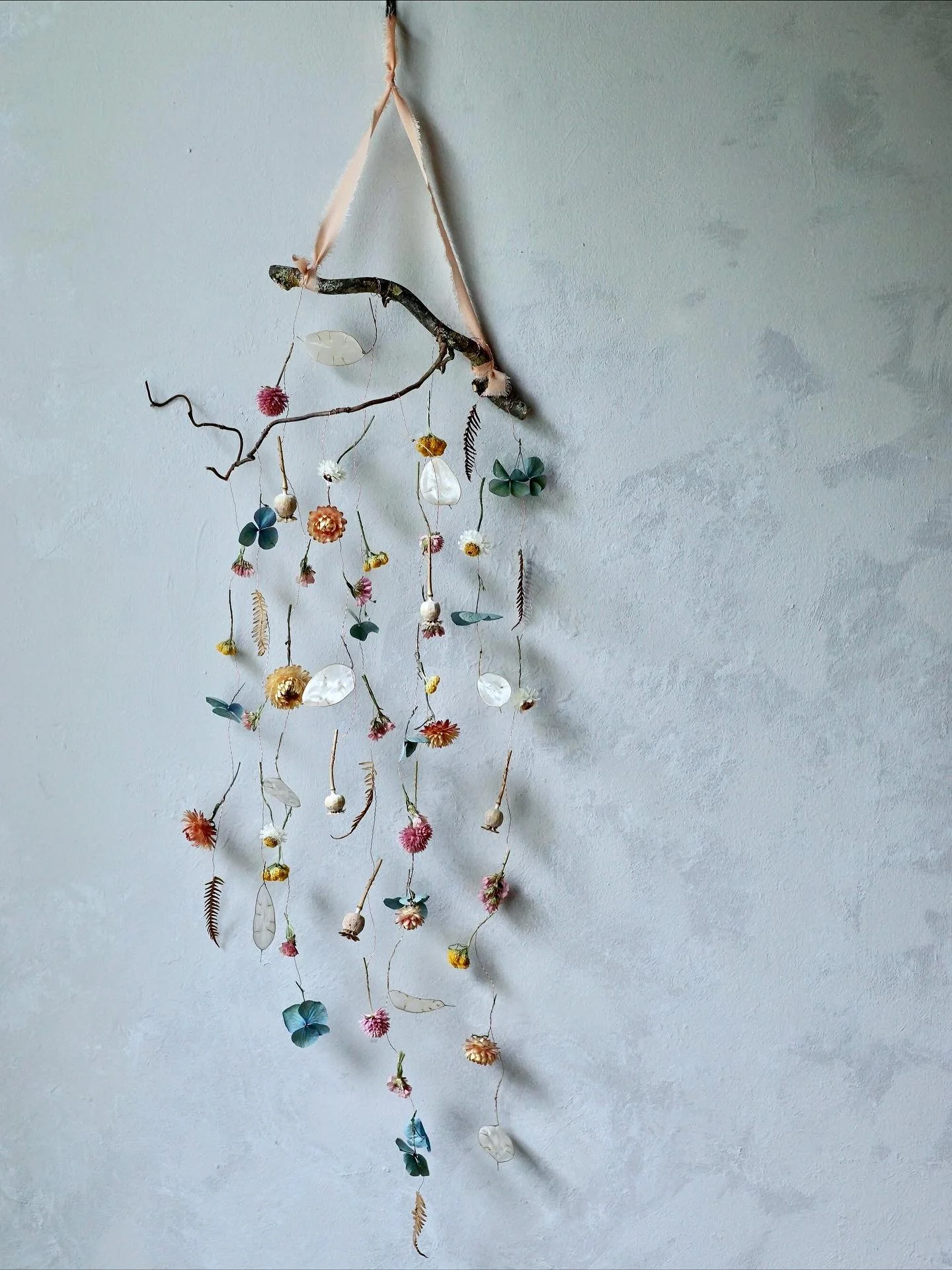 You can now order dried flower mobiles through my shop!

Request a bespoke design by letting me know your preferred colours or you can purchase one of the pre-made mobiles. Each one is made with a pretty selection of delicate dried flowers and seed h