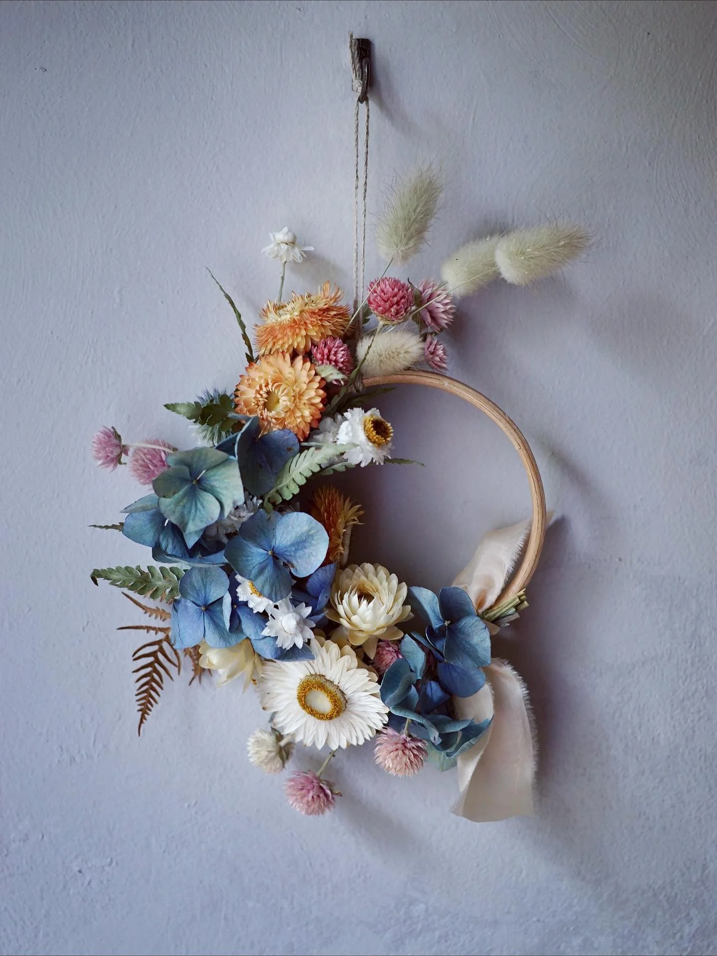 Mini hoop of dried blue hydrangeas &amp; my other favourite flowers 🩵

This one&rsquo;s for sale in my shop if you fancy hanging it in your home 🌸

🌞🌞🌞🌞🌞

#driedflowerhoops #miniwreaths #driedflowerwreaths #minidriedflowerwreath