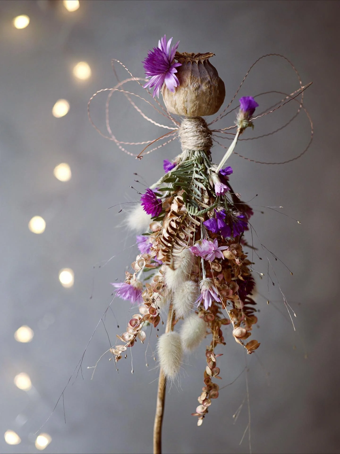 This sweet little flower fairy still needs a home 💜 
You can find her in my shop

✨✨✨✨✨

#driedflowerfairy #flowerfairies #flowermagic #driedpoppypods #poppypods