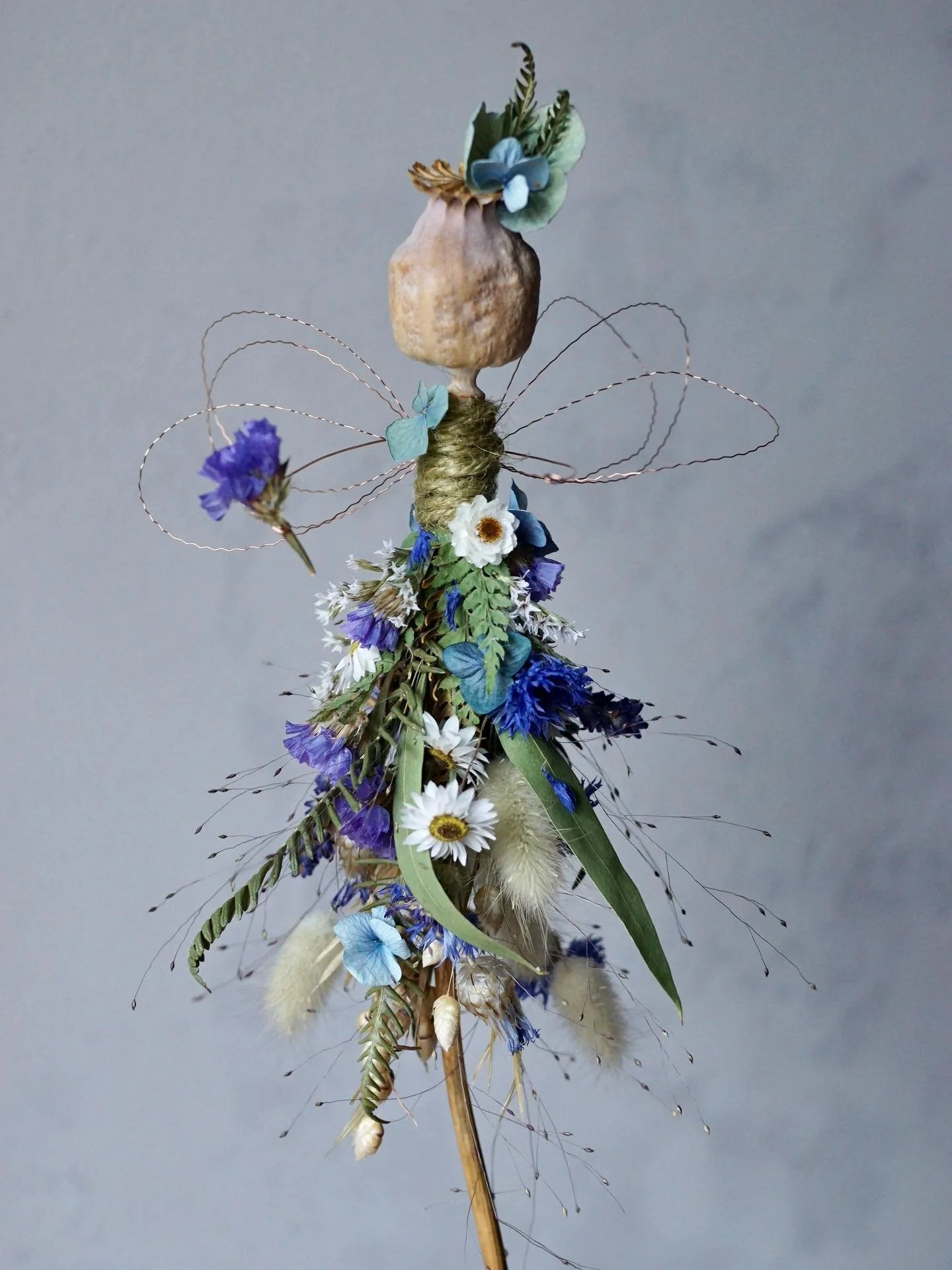 A blue flower fairy who flew off to her new home earlier this week 💙

One of my favourite flowers in this skirt is the Limonium tataricum - the tiny white star-shaped flowers near the top of the skirt. And of course the stunning blue hydrangeas 🩵

