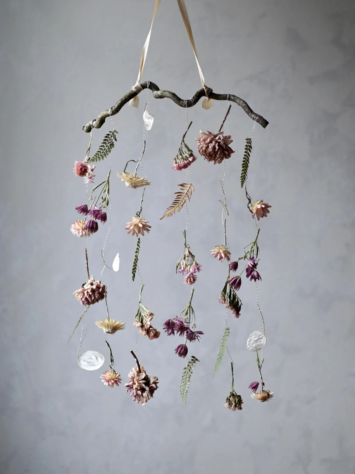 The dahlias in this mobile are &lsquo;Strawberry cream&rsquo;. When fresh, they&rsquo;re a sort of soft pink with streaks of red. After they dried to a very muted rose, I wasn&rsquo;t so sure how I felt about the colour. I guess I was a little disapp