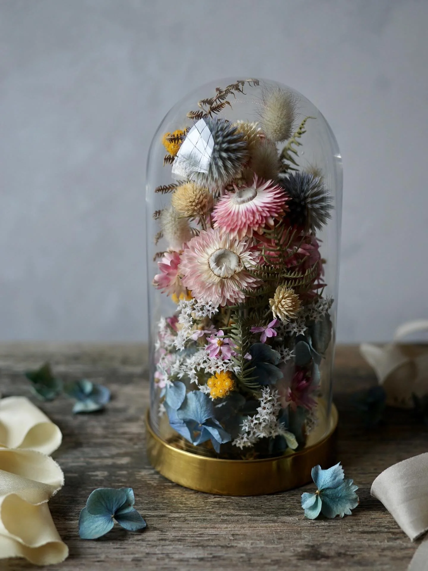 The farOpen spring group show opens this Thursday at Sixteen Gallery in Cheltenham 🌸 This is the second - and a bit smaller - dried flower cloche I&rsquo;m including in the exhibit. Pink, blue &amp; yellow colours for spring 🩵 

Please do come alon