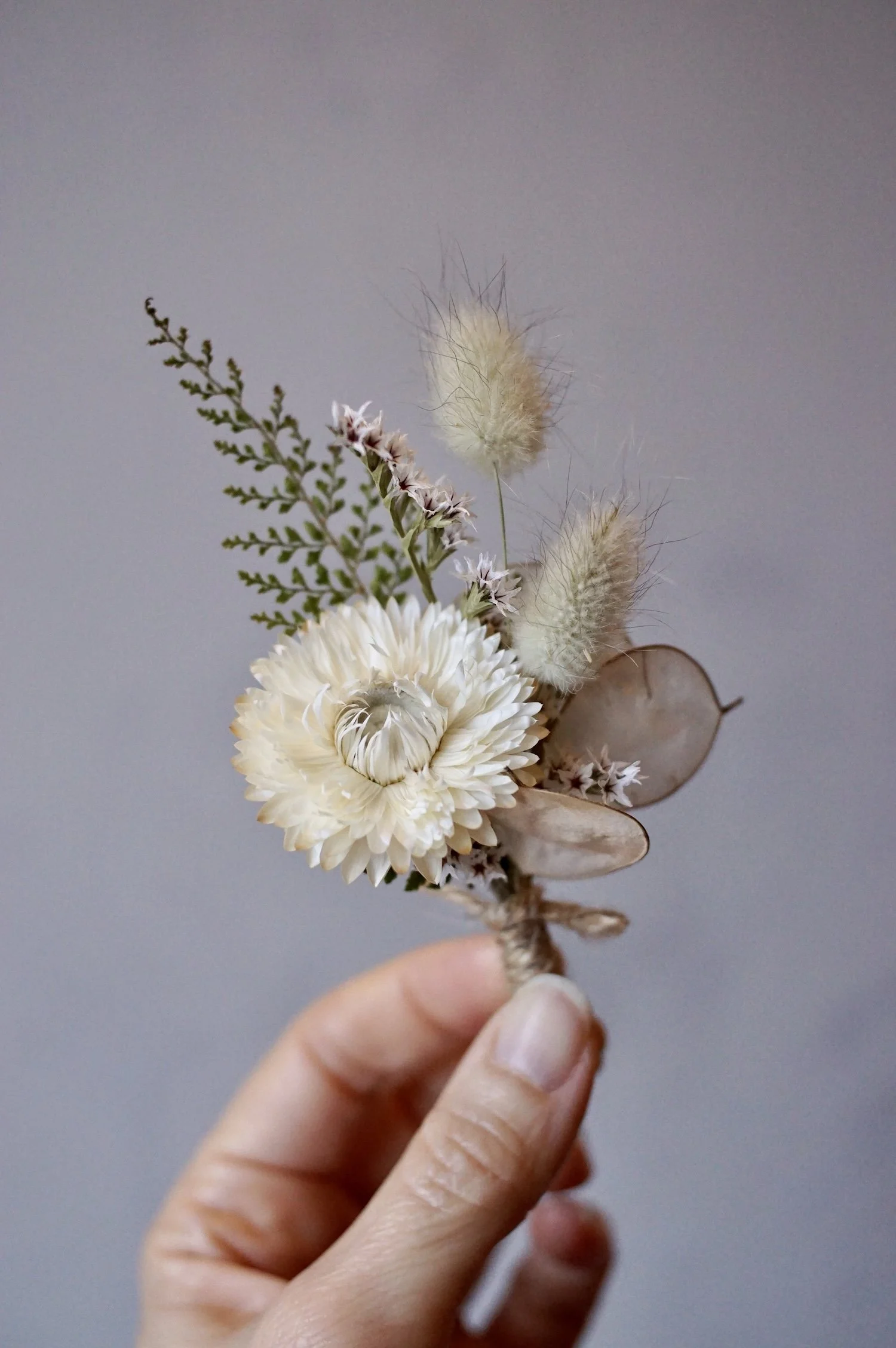 white-flower-buttonhole.JPG