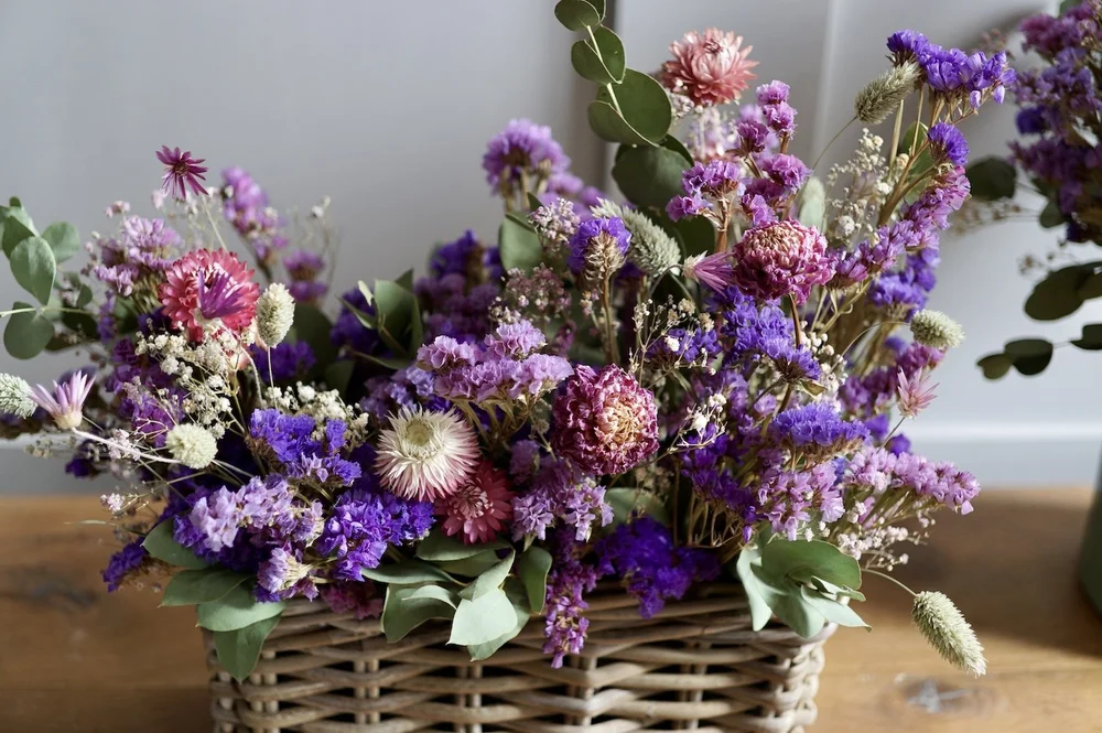 An arrangement with lots of purple statice