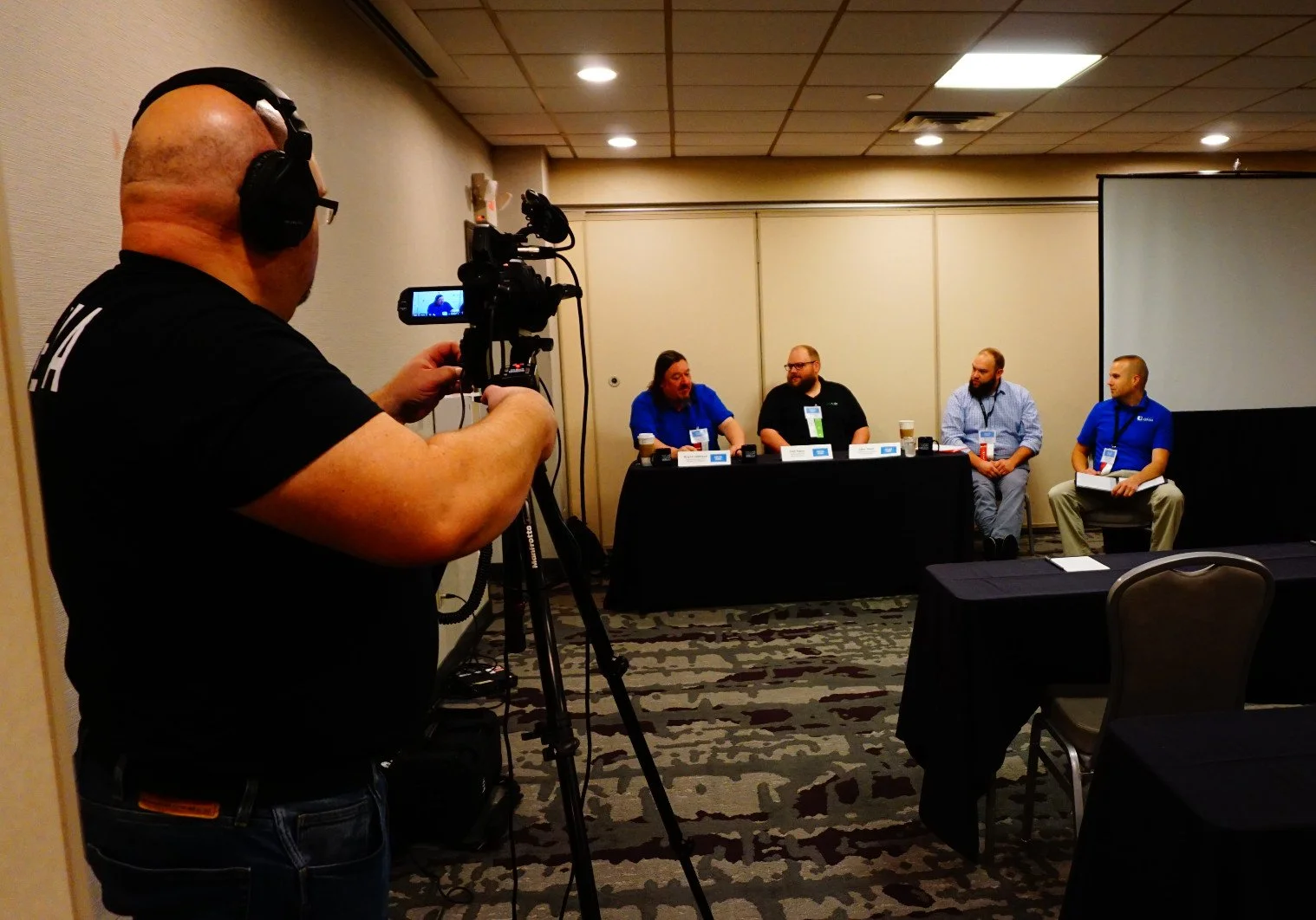 Drew Martin, Production Coordinator at WTCO in Trempealeau County records the session on hybrid meetings.