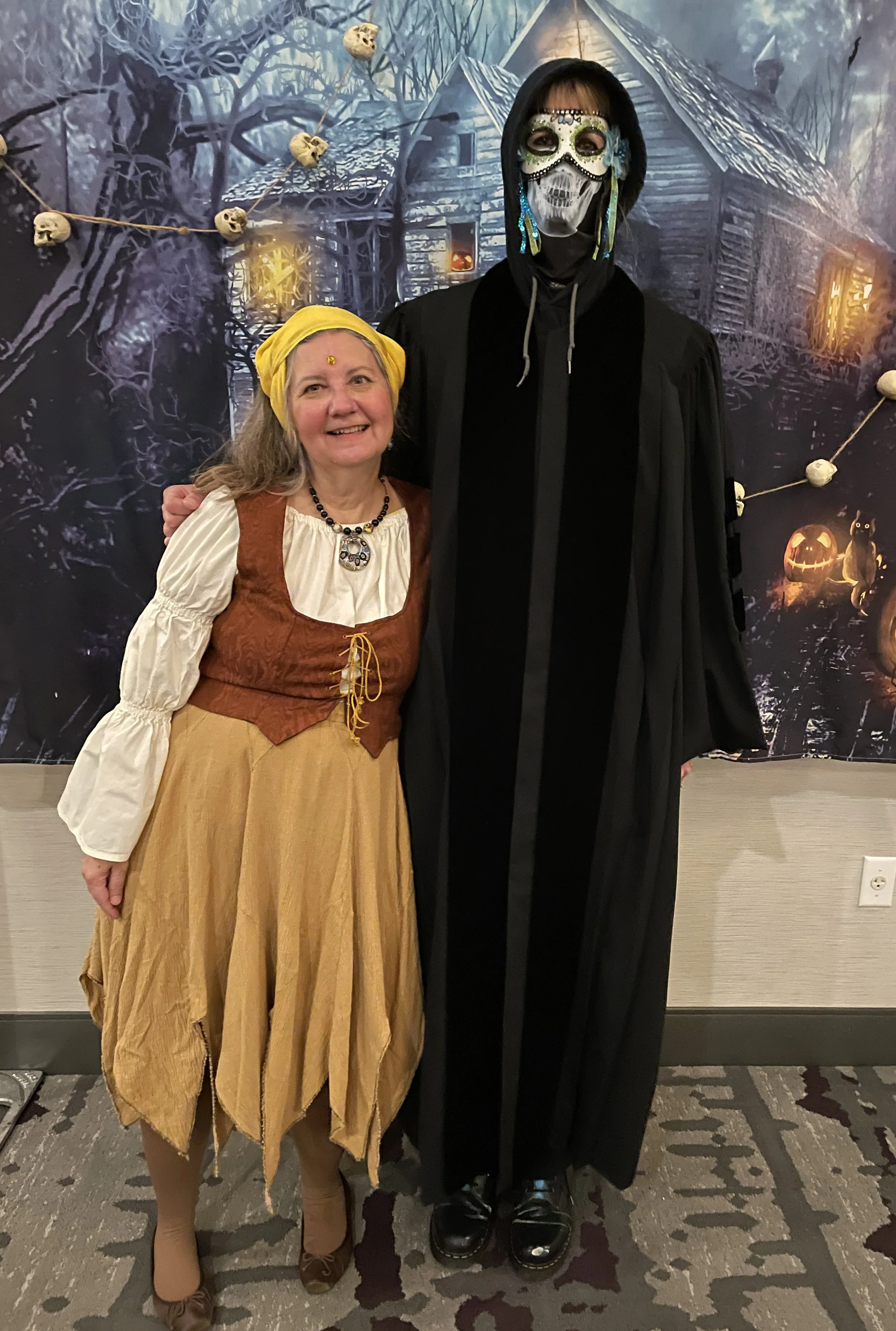 WCM Executive Director Mary Cardona with Rachel Womack of Today and Forever Videos, who won "best costume."