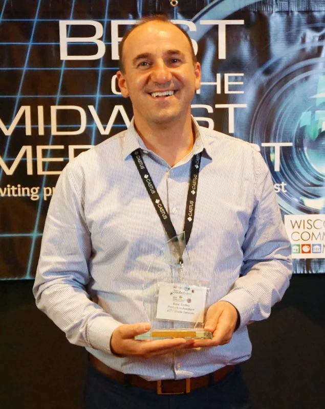  Bujar Sadiku, Janesville JATV poses with a statuette at the 2019 Fest. 