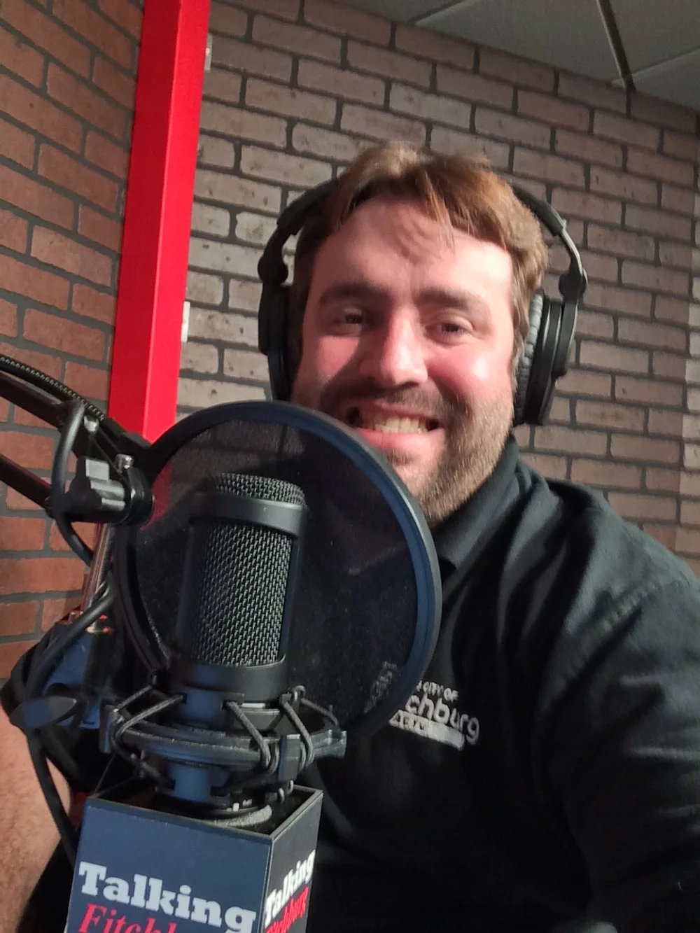 Jeremy behind the Talking Fitchburg mic