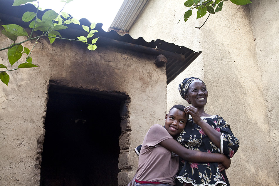  Florence Bayisenge, 16, was moved out of Mpore Pfefa Orphanage after six years and has lived with her foster mother, Pauline, in Kigali, Rwanda, for eight months.  