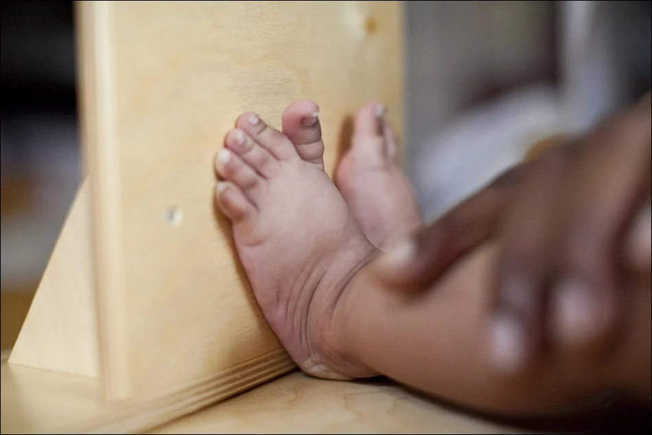 A baby gets its height measured at the medical clinic. © Laura Elizabeth Pohl
