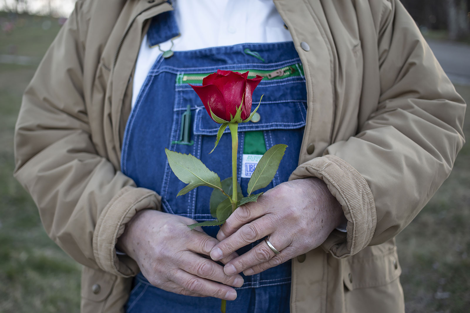 My uncle Ronnie holds a rose that was placed on my mam-maw's grave after her burial Feb. 21, 2017. Nancy Imogene Armes, 88, named after her mother and buried on a Sunday, is survived by her husband, Pete, of 71 years, two living sons, one daughter, 11 grandkids, 18 great-grandkids and two great-great grandkids. That’s a lot of youngins as she might have said. She taught me how to tie a fishing hook, bait it, cast it, and catch and clean the fish. She taught me to value the outdoors through her love of camping and spending countless hours on Watts Bar Lake, part of the TVA system just outside Kingston in Ten Mile, TN. She will be missed by all who knew and loved her. Rest easy. Nancy Imogene Armes Dec. 18, 1928 - Feb. 21, 2017 Roane County, TN.