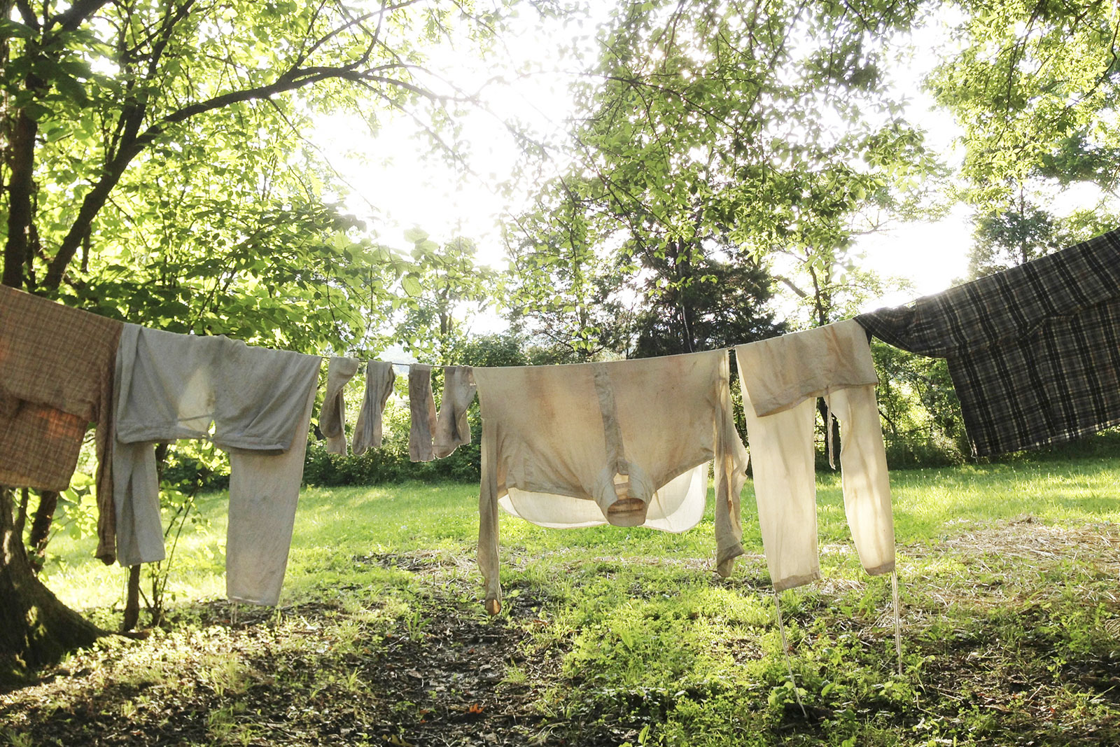 Living historians hang clothing out to dry while bivouacking in the shade and cover of Pitzer Woods at Gettysburg. It’s in these woods, the afternoon of July 2, 1863, where Confederate Gen. Longstreet would anchor the left of his line in attempt to dislodge a fortified Federal force at Cemetery Ridge.