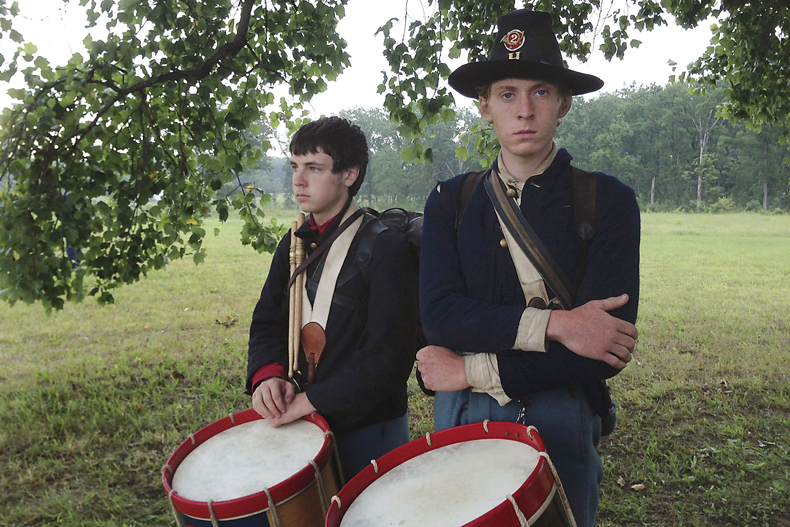 Two members of a drum and fife corps stand ready to play during a living history demonstrations at Gettysburg National Military Park.
