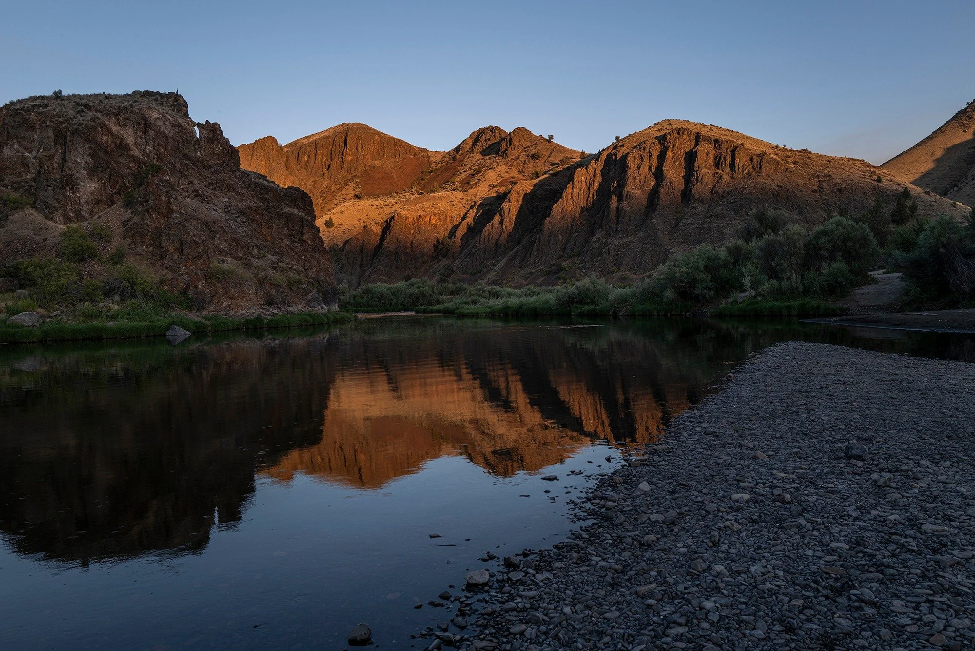 To Be a Coyote, 1 of 4

July 15, 2025
Mitchell, Oregon 
Priest Hole

In the twilight, dry eyes strain at a figure wading across the summer shallows of the John Day River. Just west of the rocky bend at Priest Hole, the animal blends seamlessly, mist 