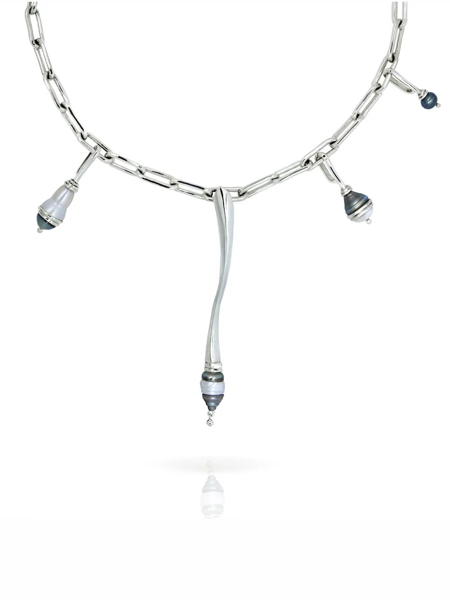 Close up of the Charlotte Garnett Spindrift statement pearl necklace, made from sterling silver, mixed pearls and diamond.