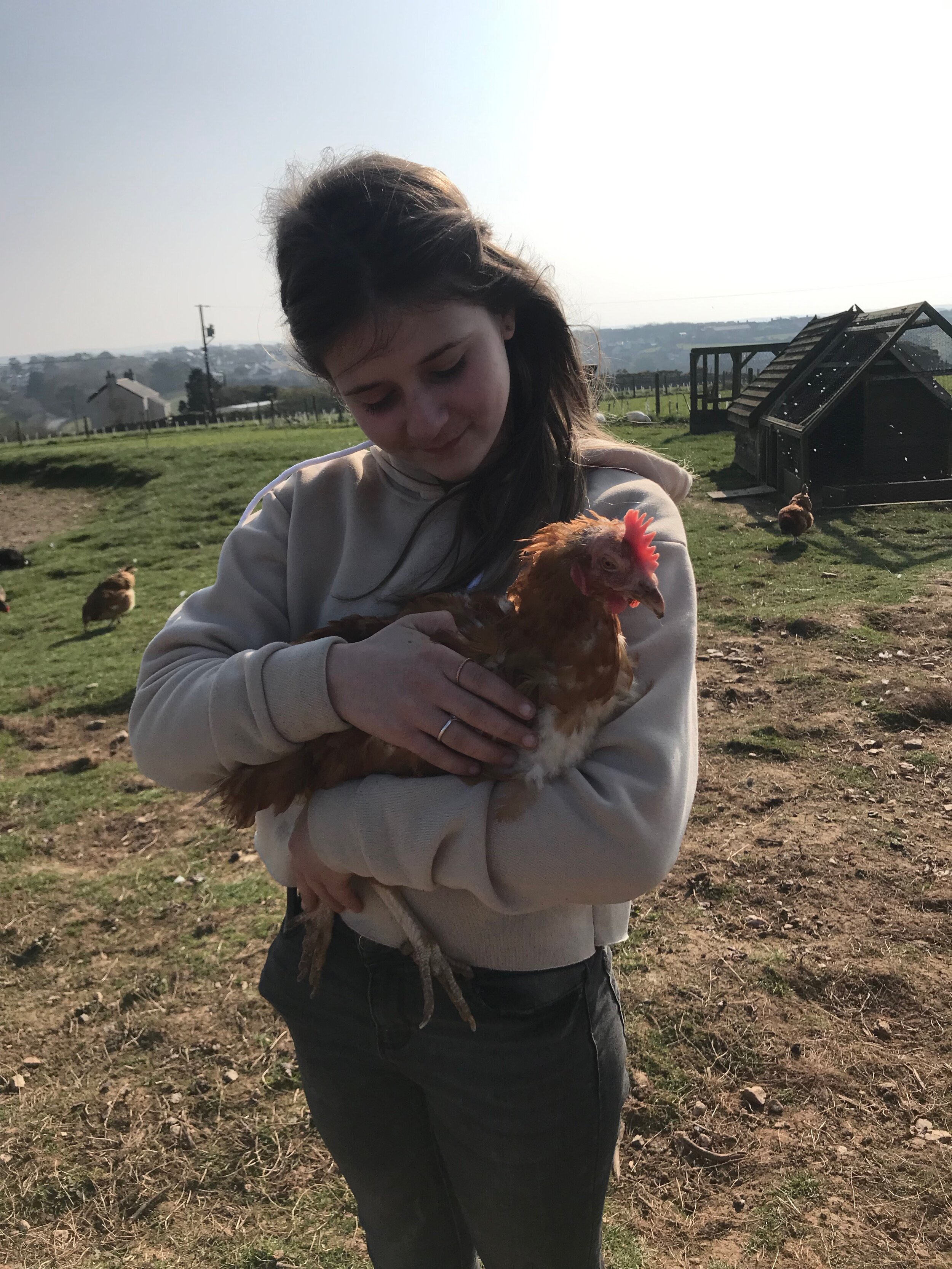 Holding chicken.jpeg