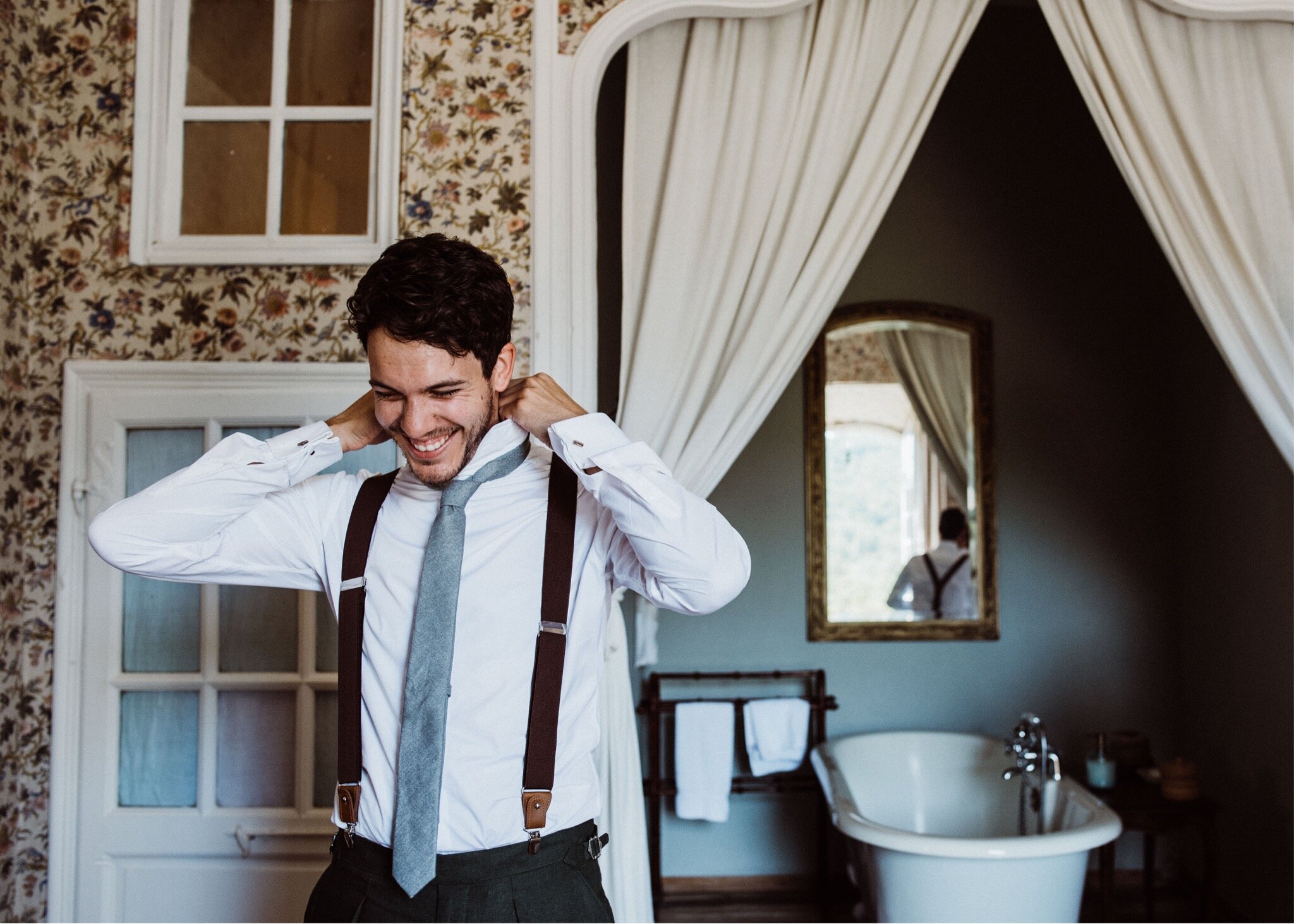 08_Katie + Iain Blog-15_french_destination_prep_chateau_photography_groomsmen_best_groom_man_wedding.jpg