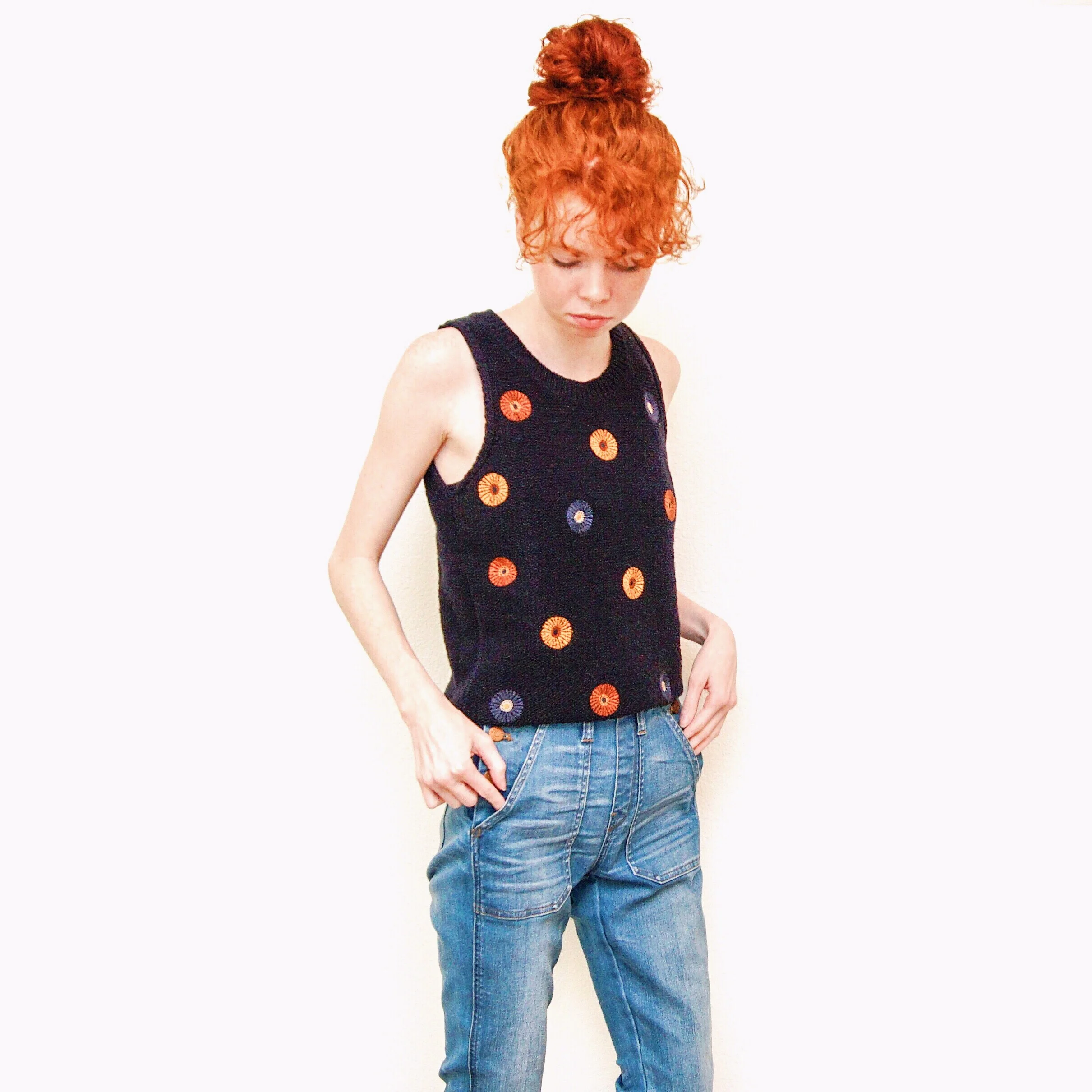 girl-in-jeans-and-sweater-tank