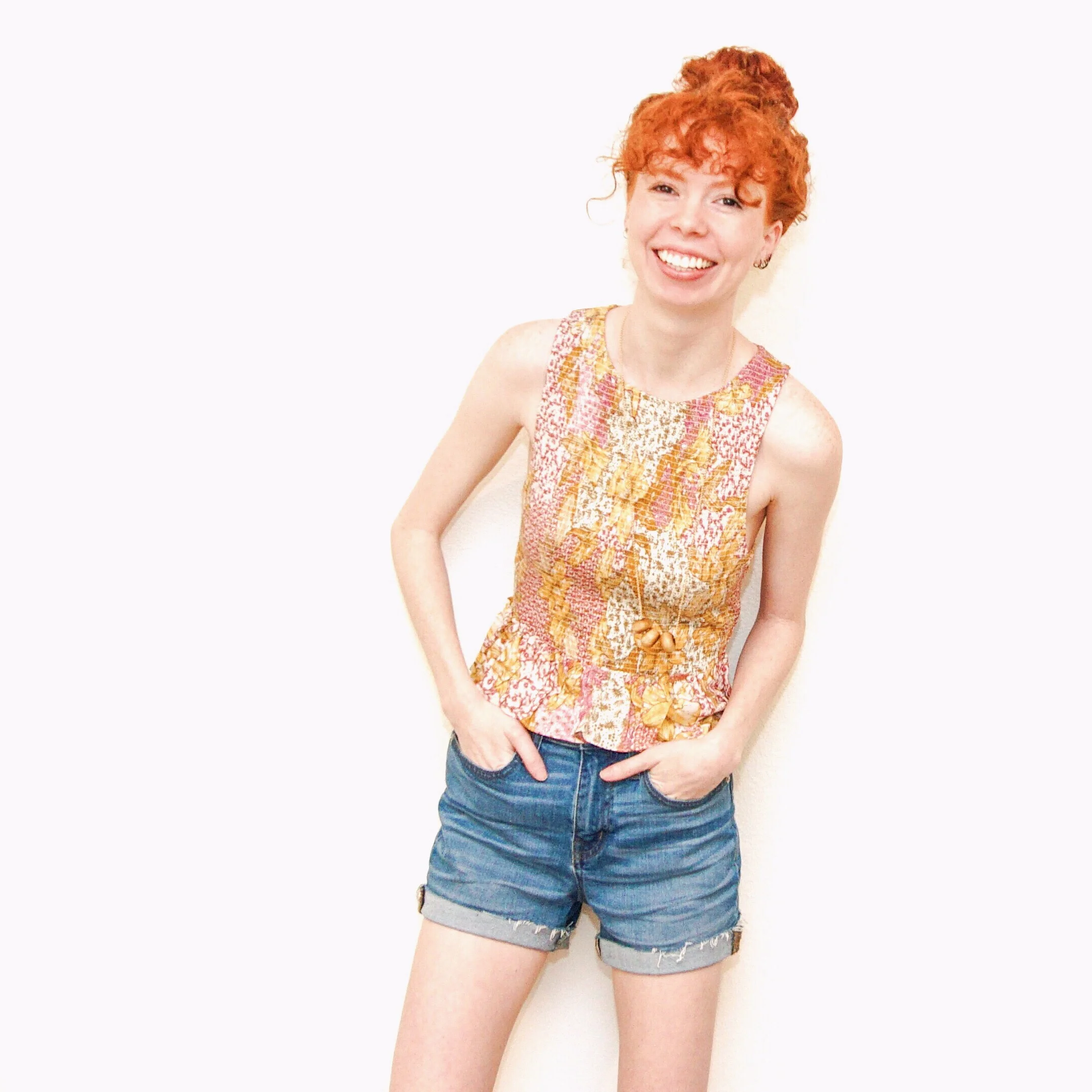 girl-in-floral-tank-and-jean-shorts