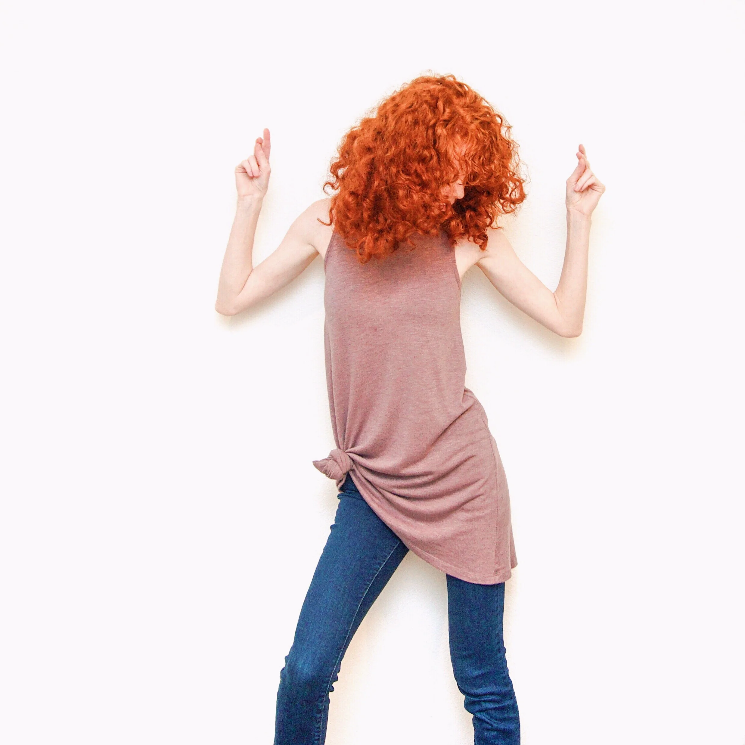 girl-in-dark-jeans-and-tunic