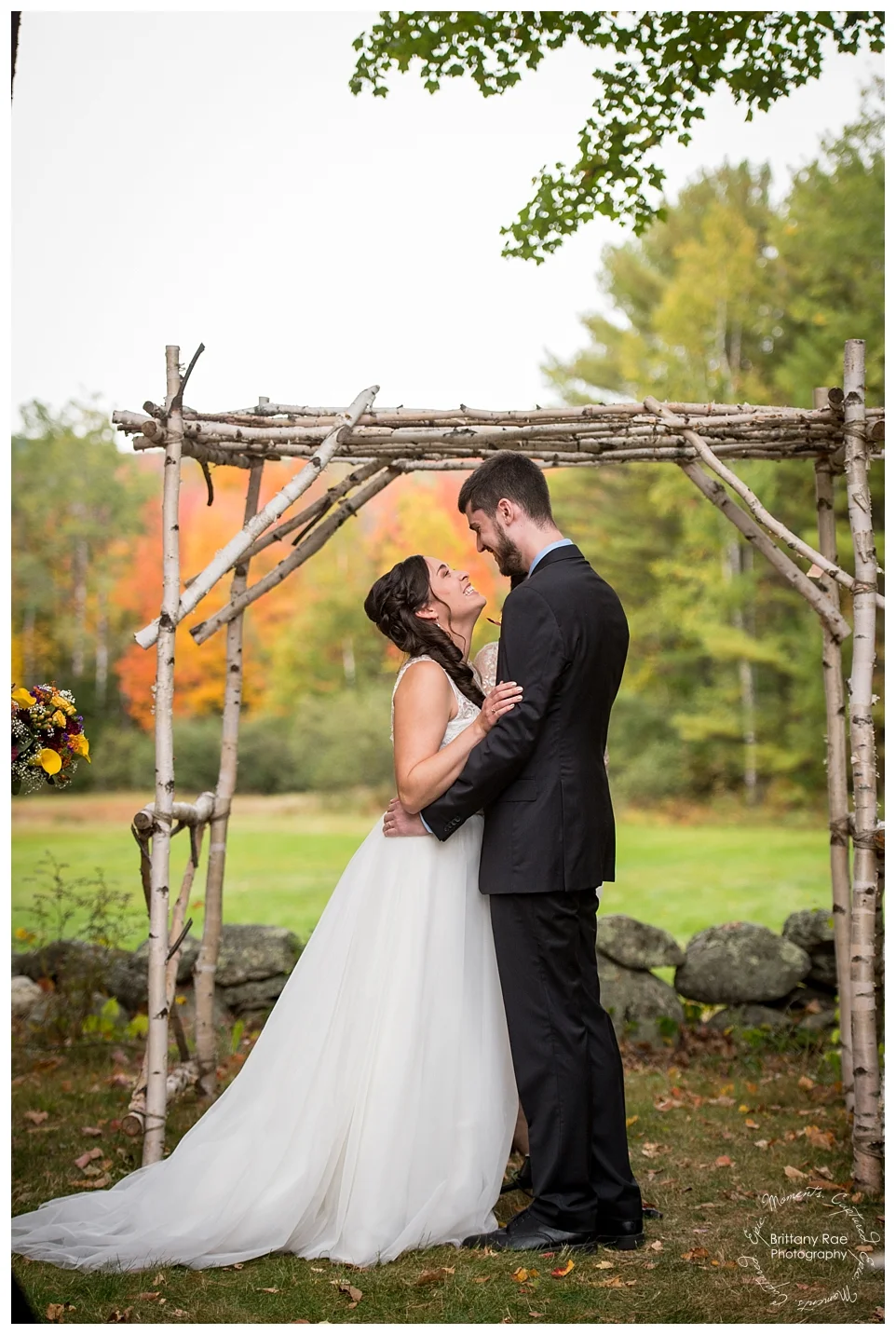 Best Wedding Photos of 2016 by Maine Wedding Photographers - Romantic First Kiss at this Kings Hill Inn and Barn Wedding