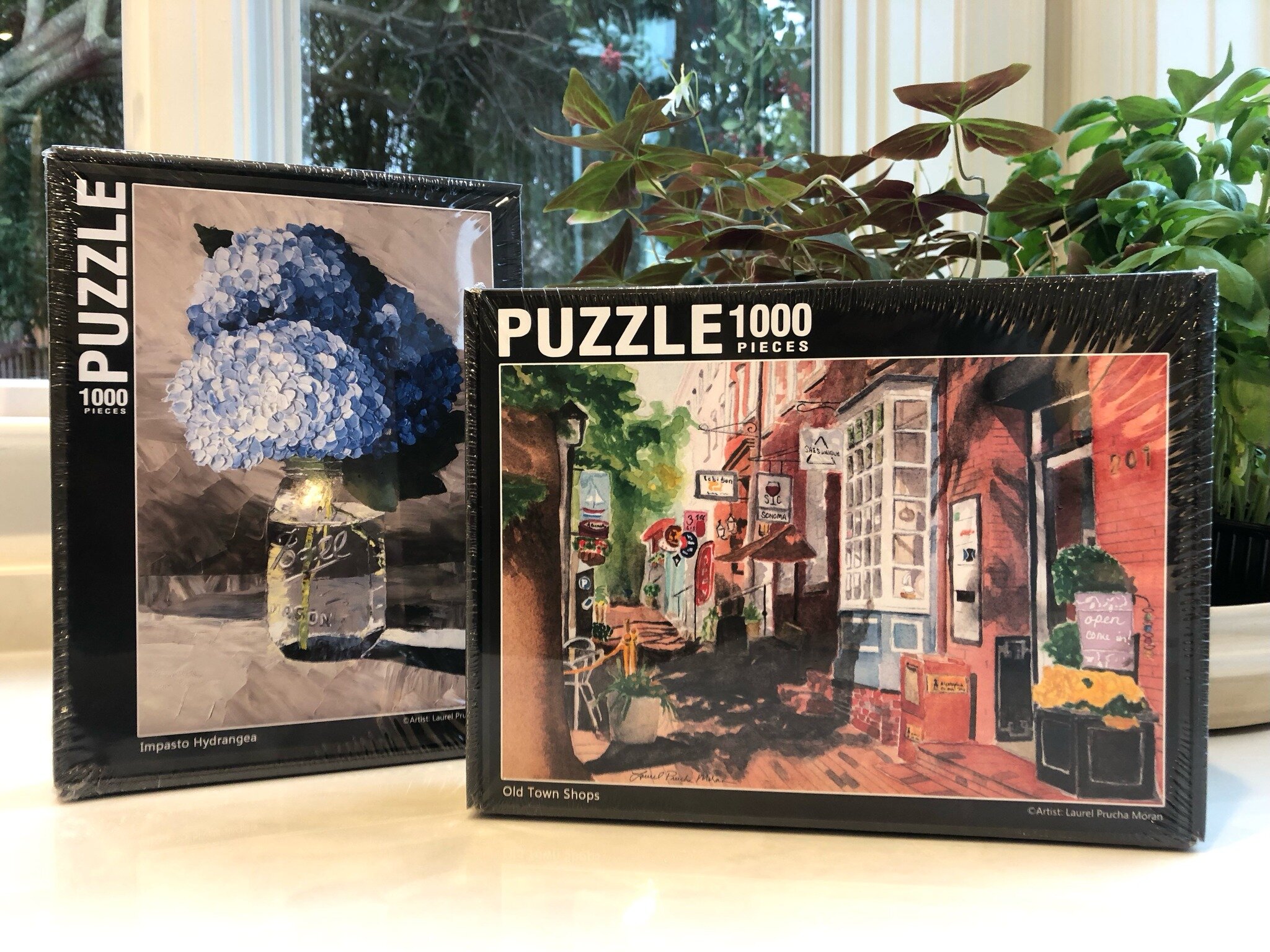 Exciting news! I&rsquo;ve turned my best selling watercolor painting of King Street in Old Town Alexandria, and my oil painting of hydrangeas in a mason jar into 1000-piece puzzles. They&rsquo;re available on my website (www.blueroomstudio.com) or pi