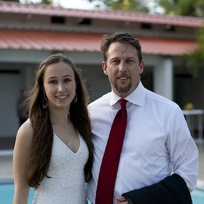 Tori Dunn with her father, Jay Dunn (former Executive Board member) at Mariposa’s grand opening in 2014.