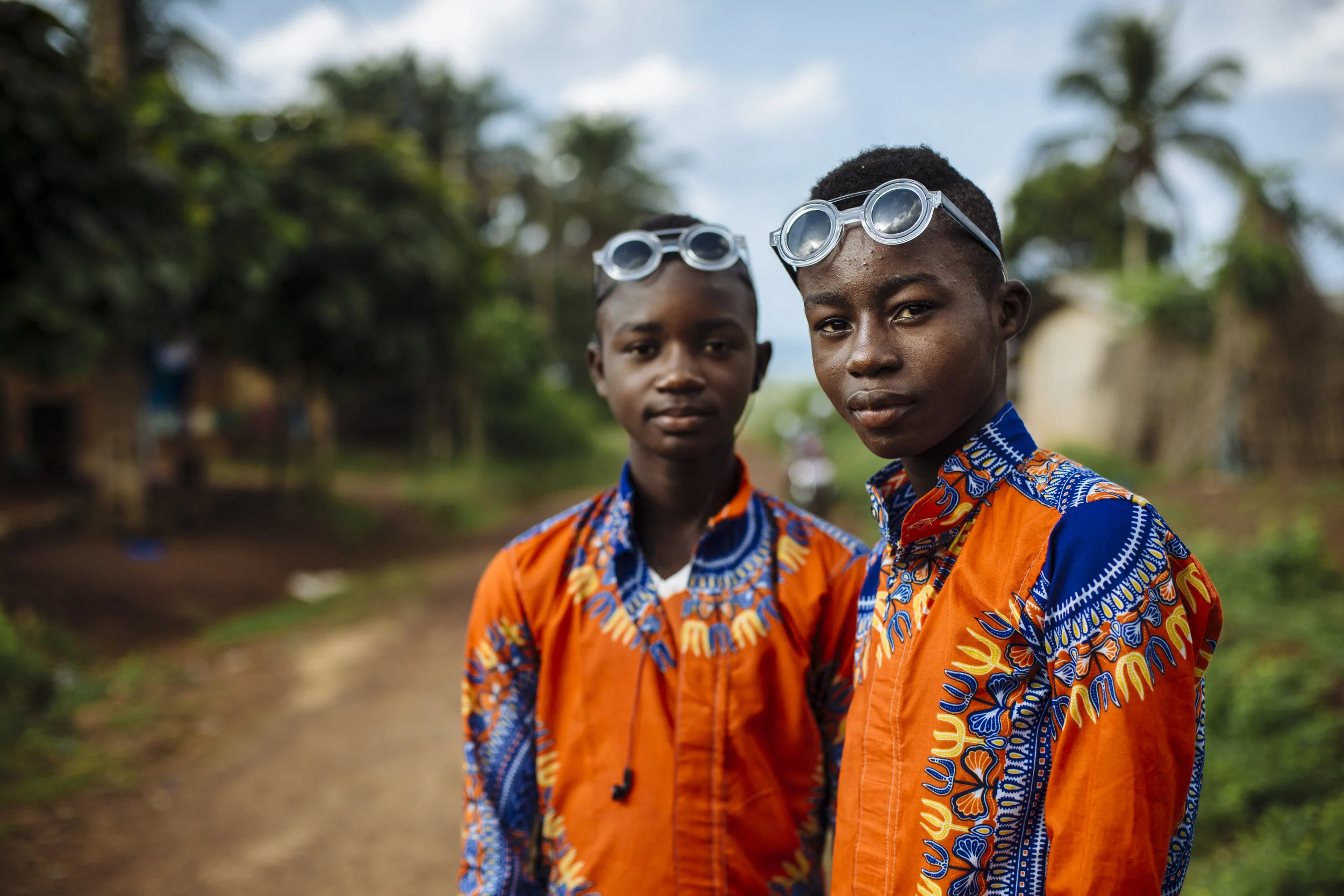 Brothers pose for a portrait in Tabou, Bas Cassandra district, Côte d’Ivoire, Thursday, May 26, 2016.