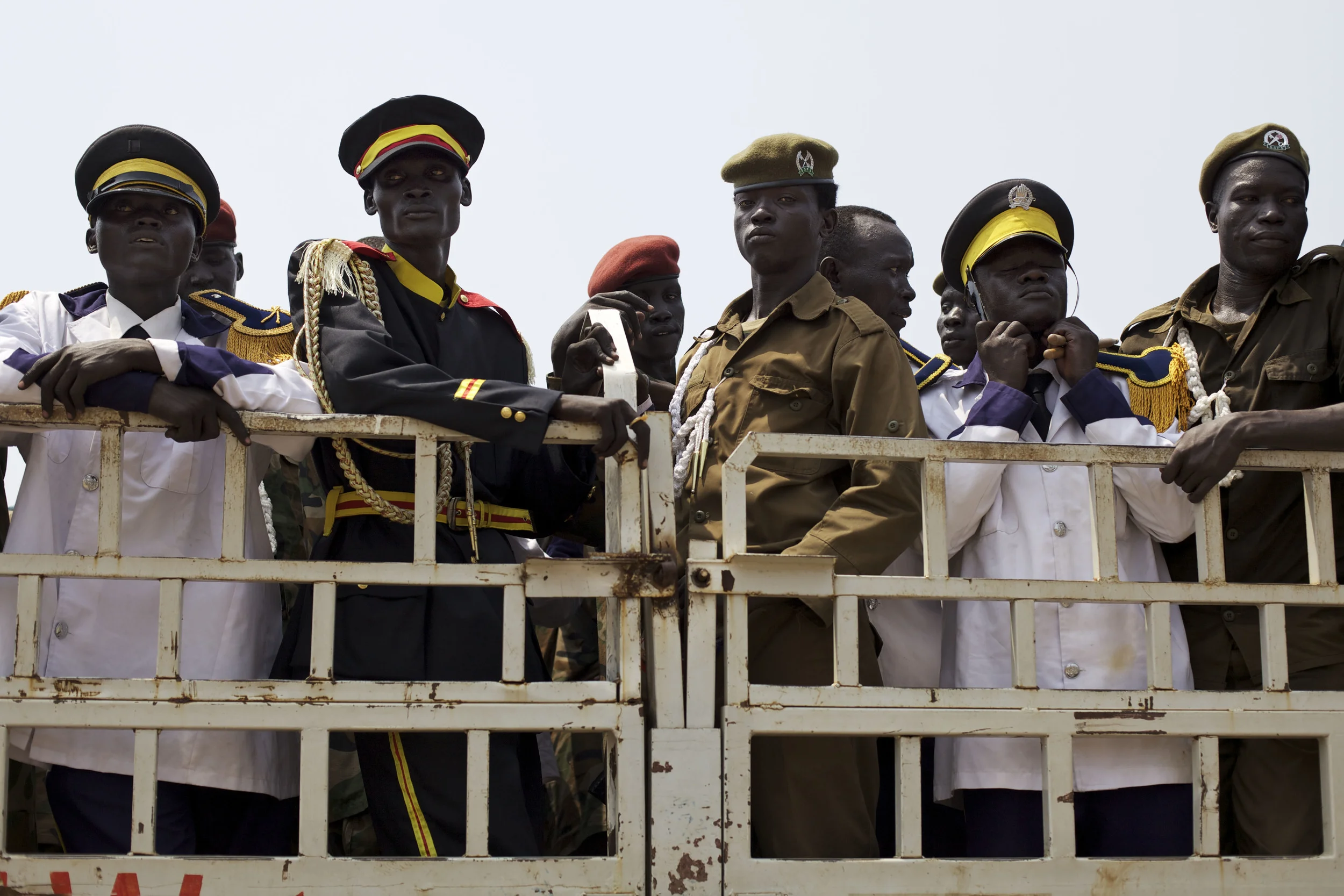 Police officers and members of a band are seen aboard a truck ahead of a rehearsal for independence celebrations in Juba, southern Sudan, Thursday, July 7, 2011. South Sudan is set to declare independence from the north on Saturday, July 9th. (AP Photo/David Azia)
