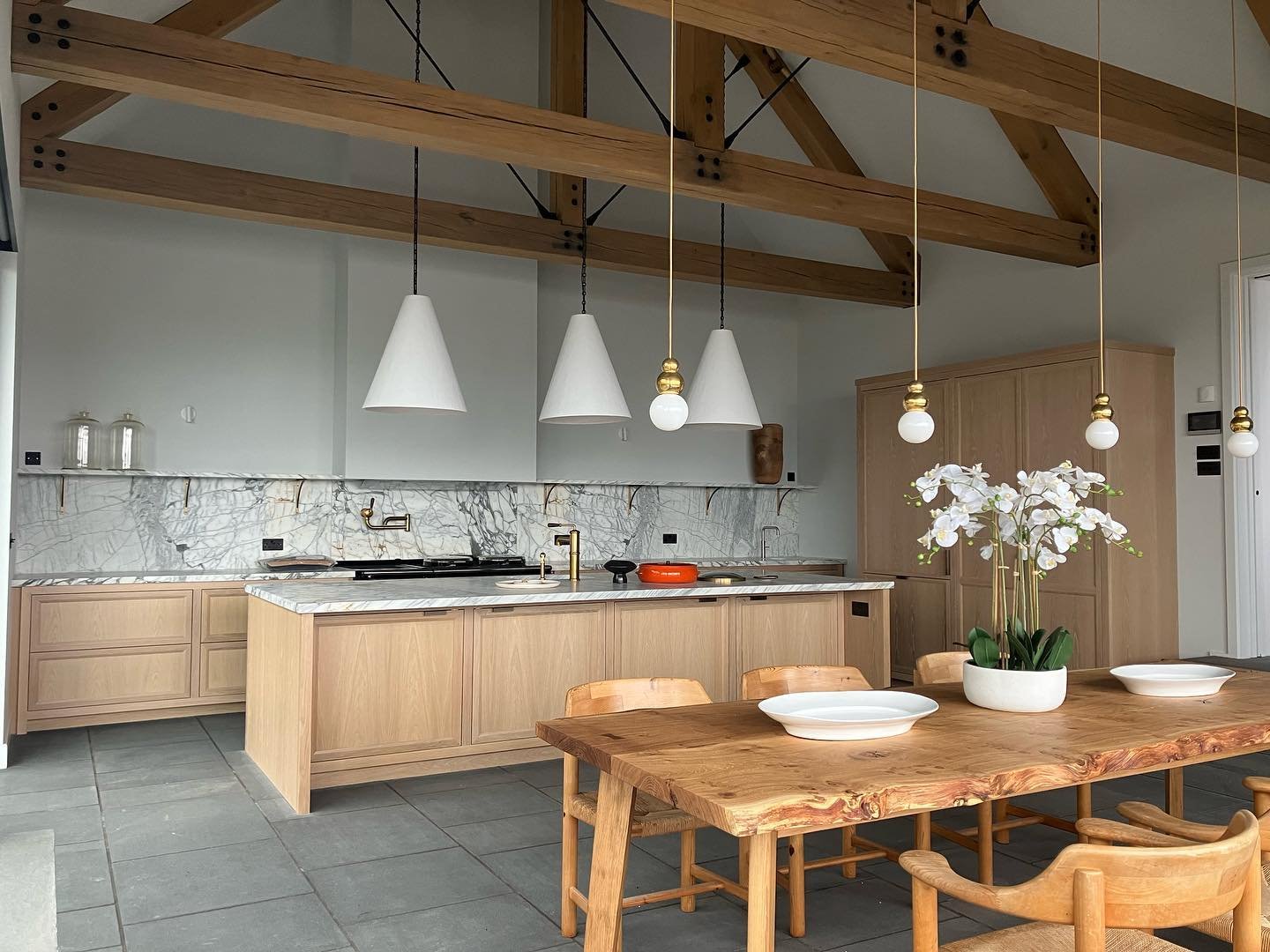The beauty of a handmade bespoke kitchen means that you have a kitchen space that is designed and built specifically for your needs and lifestyle and very inch is maximised for functionality with no wasted space or filler pieces. 
From custom storage