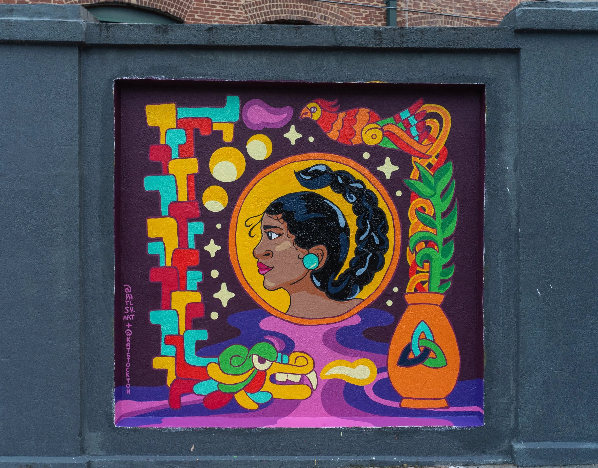 Geometric drawing of an outline square with sections divided by vertical, horizontal, and half circle lines.