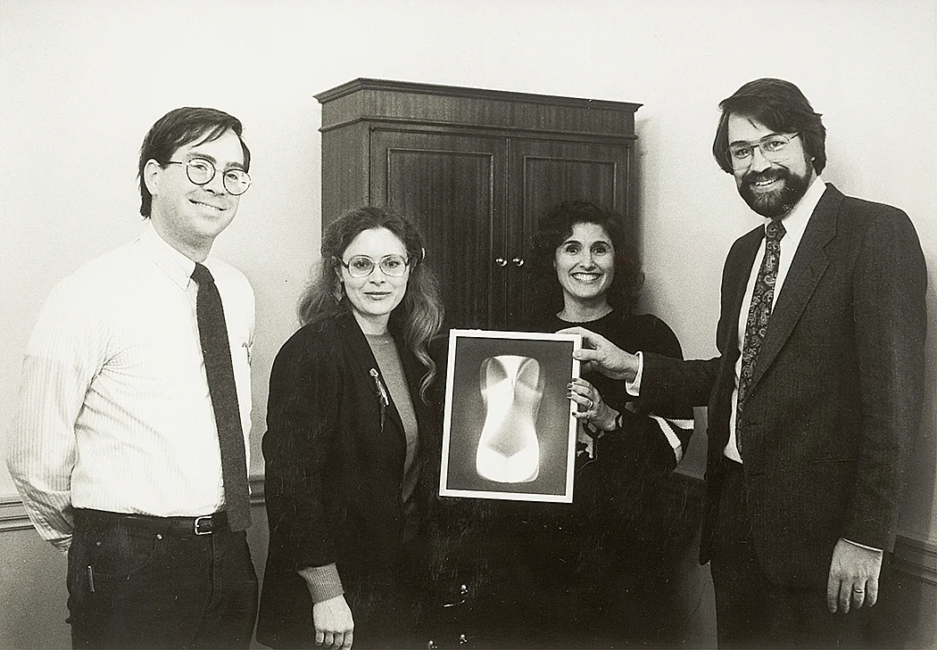 Commemorative photo of the first digital PHSCologram, Etruscan Venus , NCSA. Left to right: Tom DeFanti, Donna Cox, Ellen Sandor, and Larry Smarr, circa 1986. Courtesy of Ellen Sandor, (art)n.