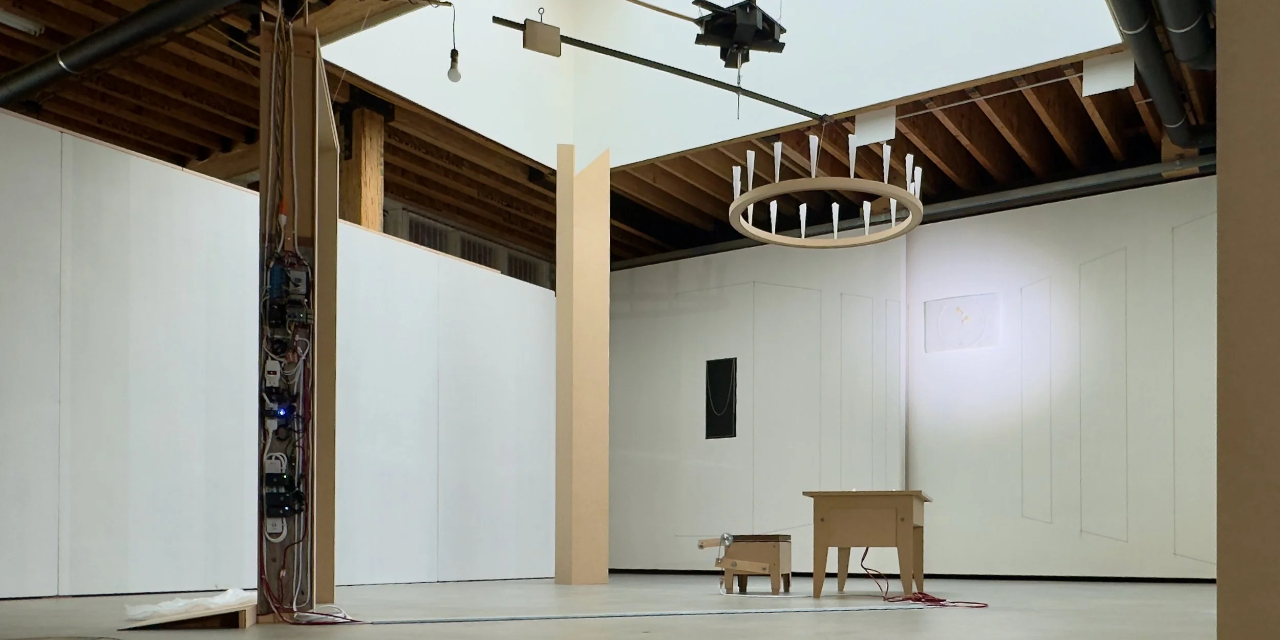 H O M E ≠ H•O•M•E is an automated fictional living room exploring the fine line between loneliness and solitude. Drawing from Zen Buddhist idea of "be a home for yourself," the work invites viewers to engage with these shifting emotional states throu