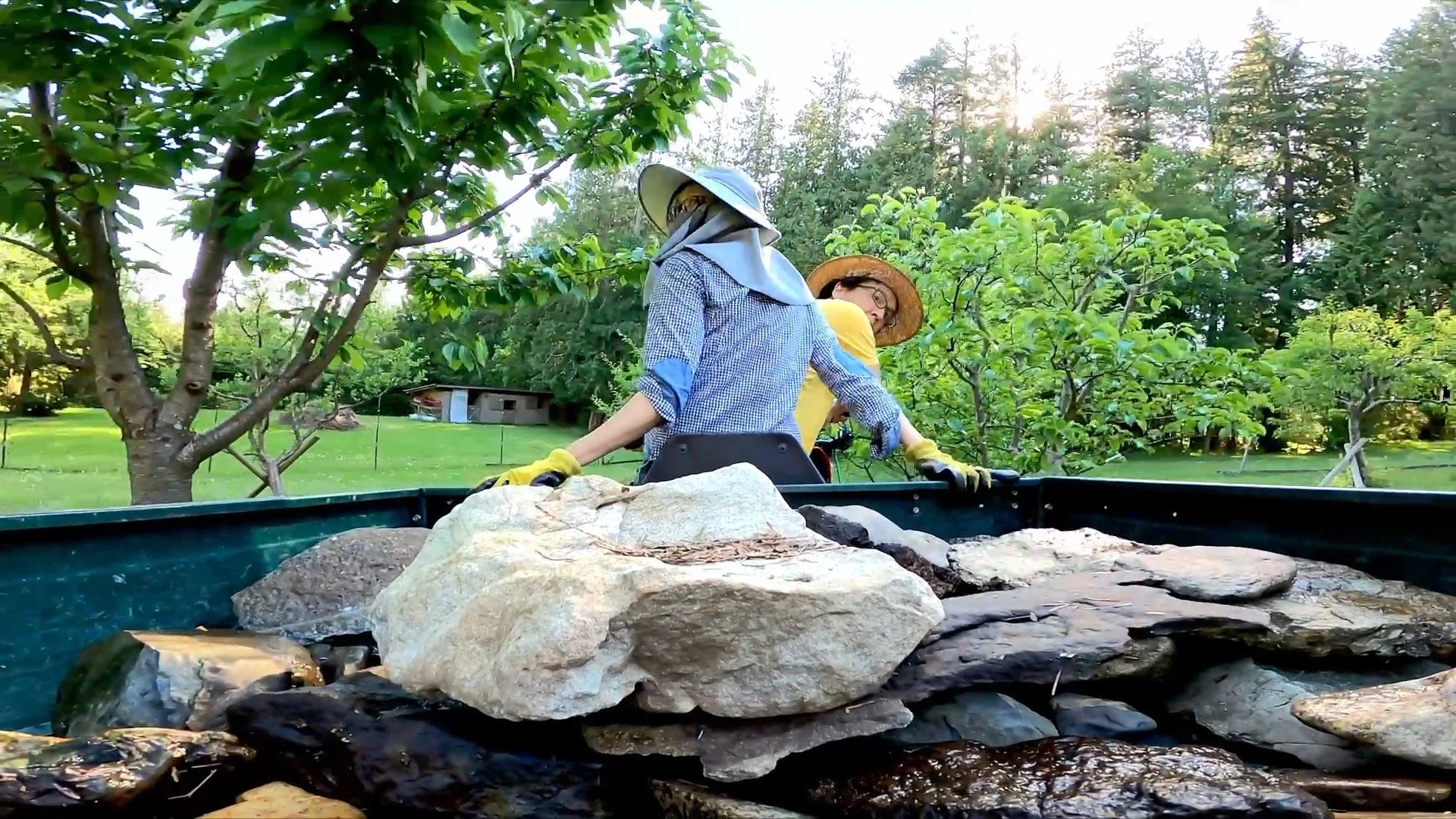 Roger and Wan-Yi working on their land where they have resided for over 20 years, learning to coexist with nature and strive to be as self-reliant as possible.