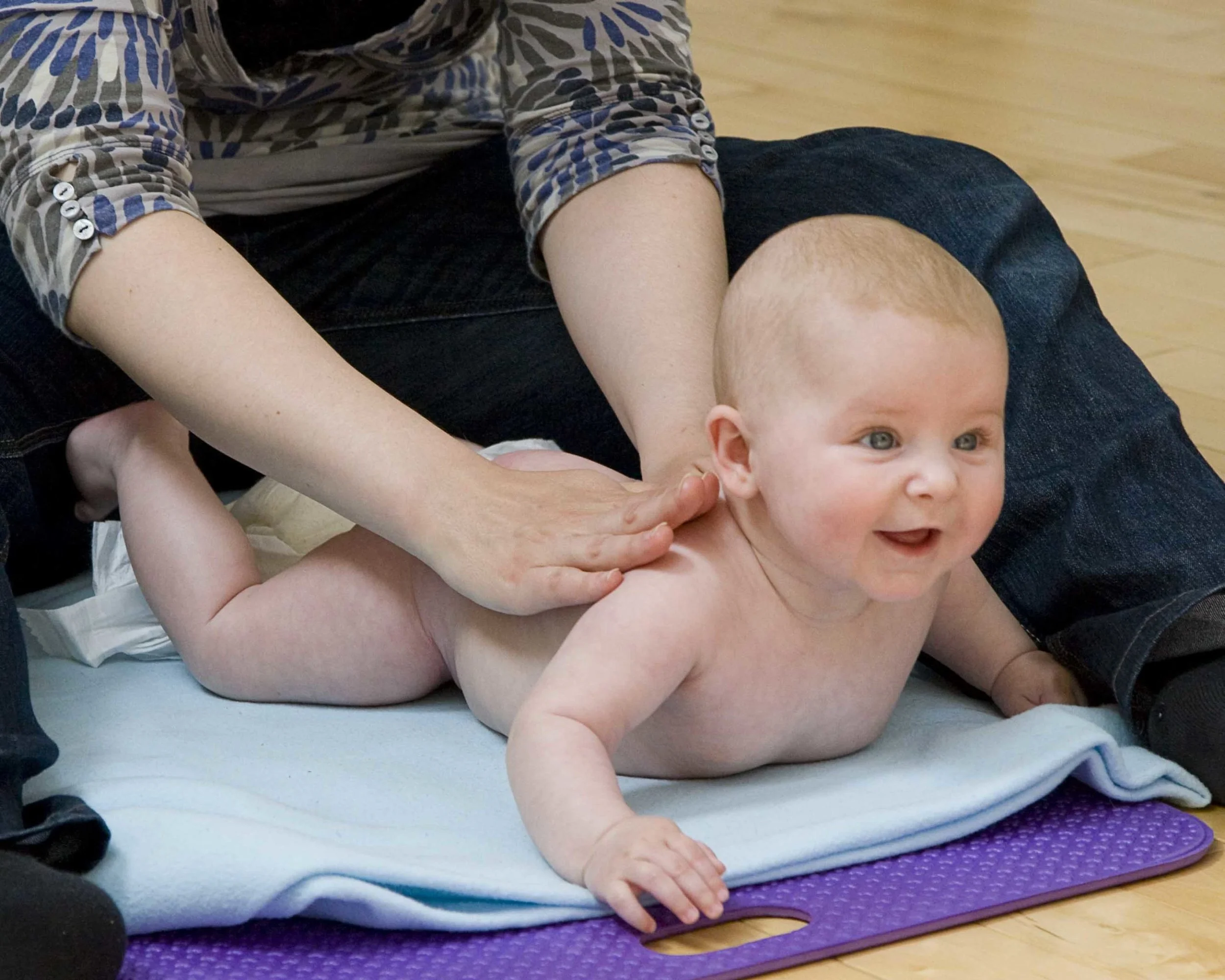 Isabella-loving-tummy-time-and-a-Governing-Vessel-massage-scaled.jpg