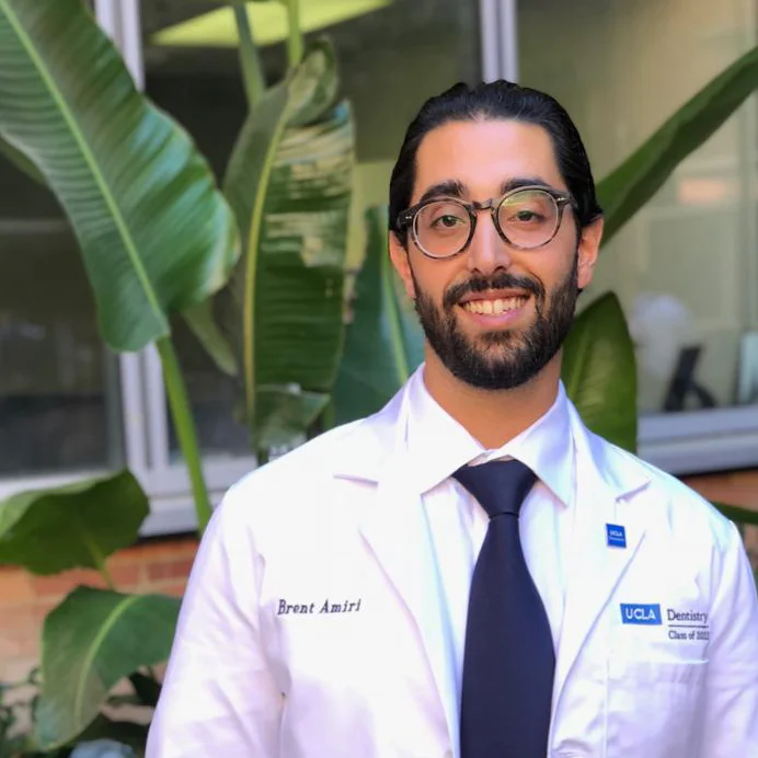 Brent Amiri - headshot white coat photo UCLA SOD 2.jpg