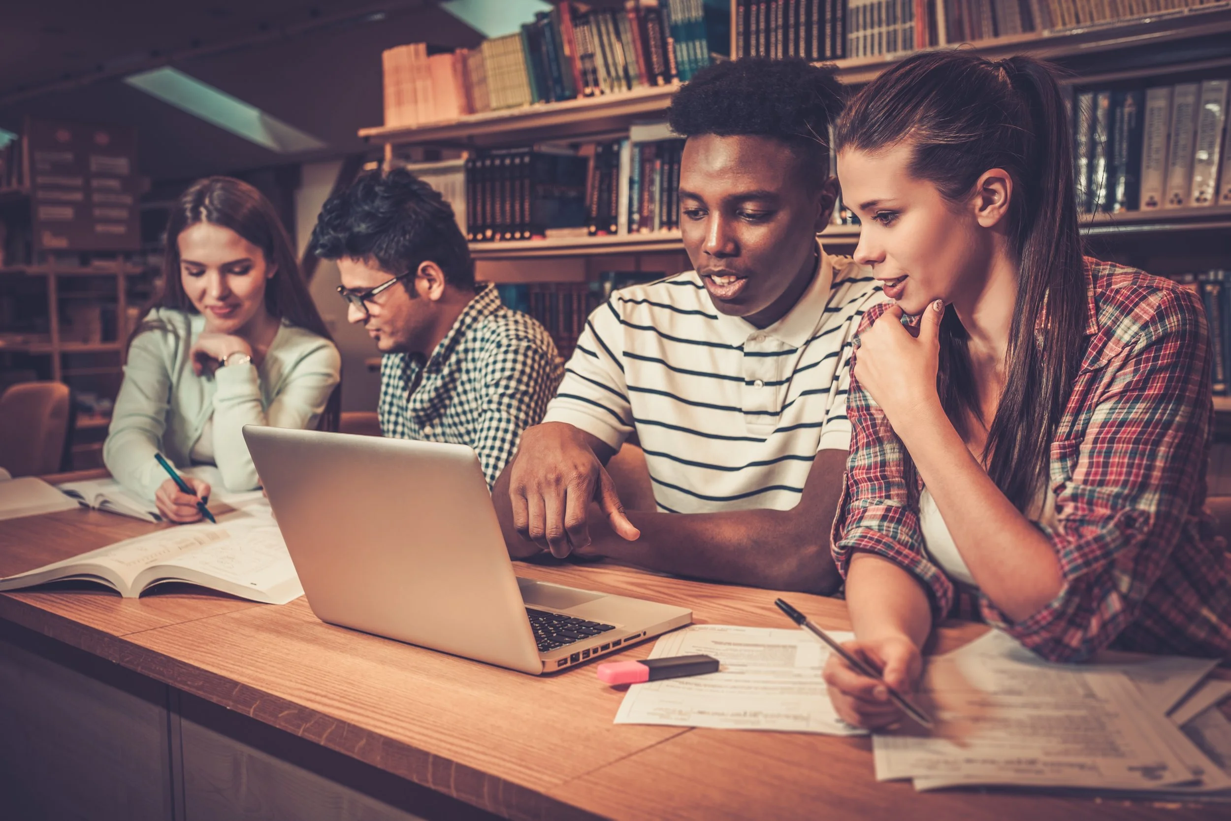 multinational-group-of-cheerful-students-studying-PK28WTC.jpg