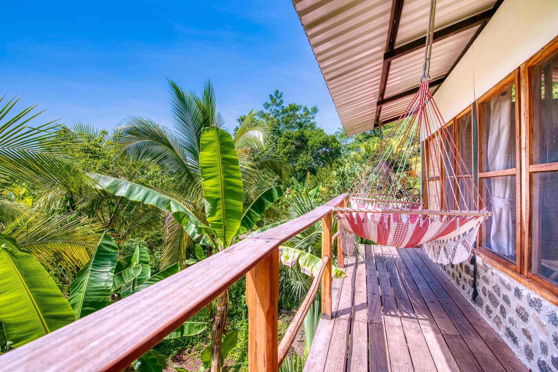 Casa Chilamate balcony, canopy-top cabin, jungle cabin, Selvista Guesthouse collection .jpg