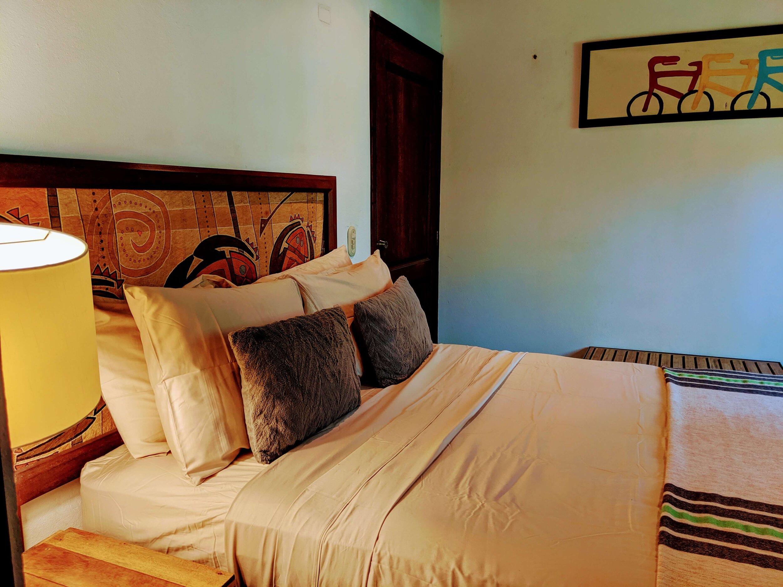 lower floor bedroom interior comfortable room double bed house for rent weekend Pacific Coast Nicaragua.jpg