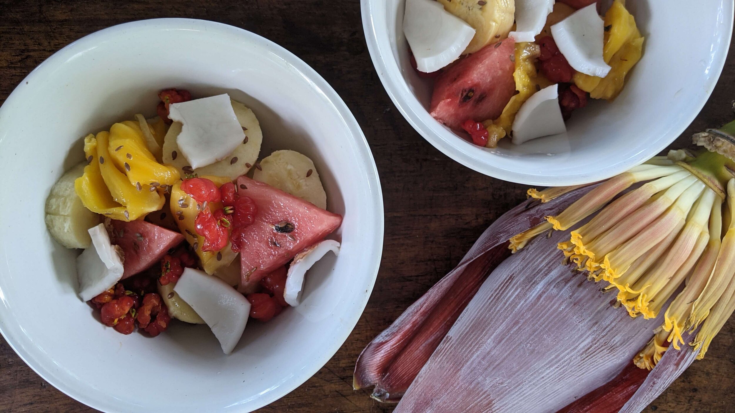 seasonal breakfast fruit bowl and the ever-available banana flowers.jpg