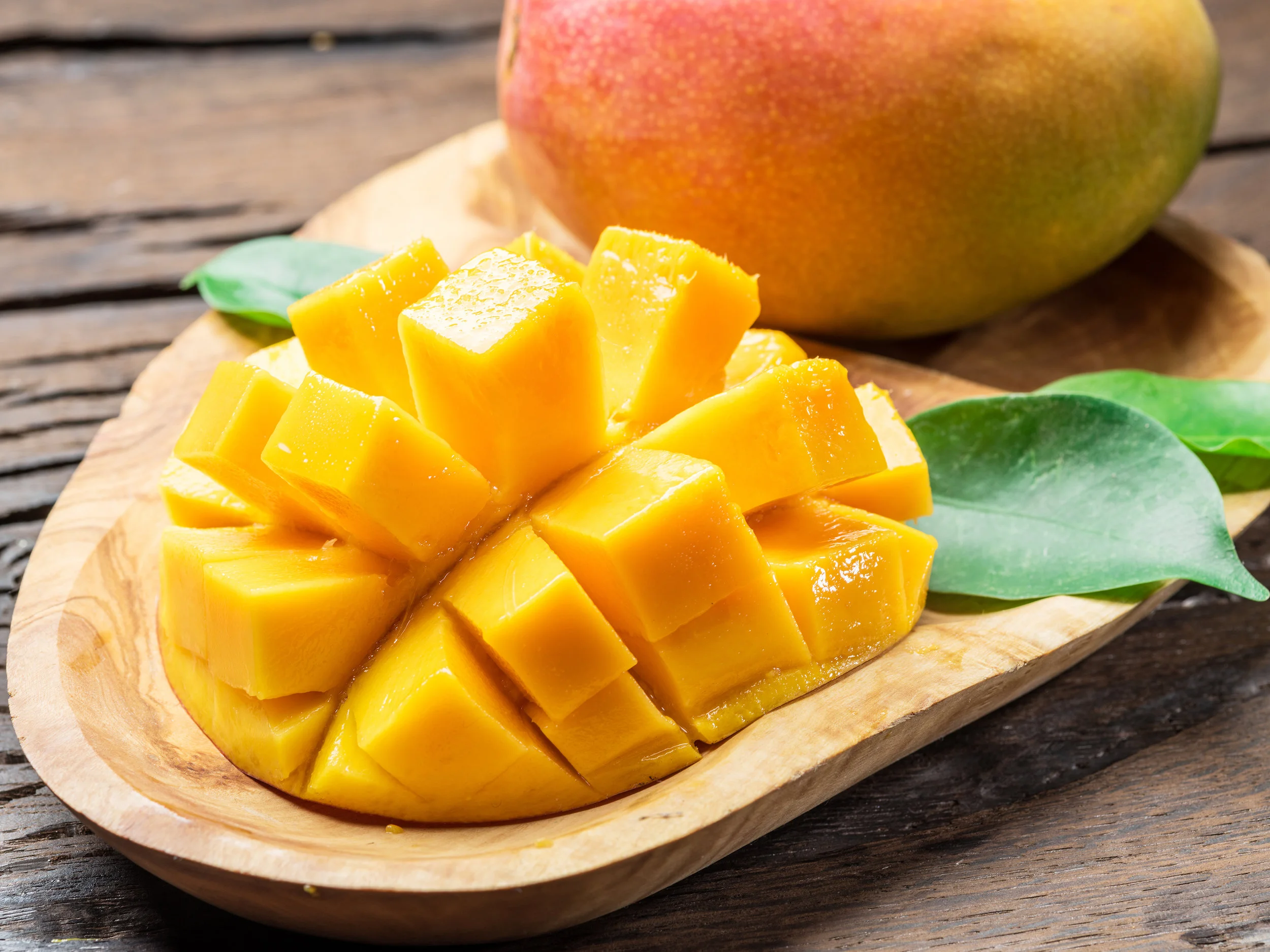 bigstock-Mango-fruits-and-mango-slices--230071174.jpg