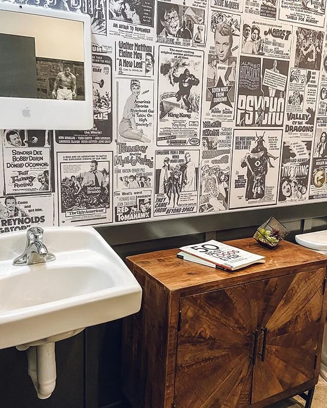 What happens when I don&rsquo;t have a home project to focus on &mdash; I get my work to let me play with their spaces! 
For the guys&rsquo; bathroom, I partnered with the talented owner/creative director of my agency to get these sweet vintage movie