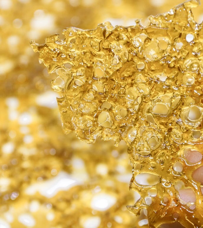 AK-47 Shatter = 1G - $40 Don't let its intense name fool you: AK-47 will leave you relaxed and mellow. This sativa-dominant hybrid delivers a steady and long-lasting cerebral buzz that keeps you mentally alert and engaged in creative or social activities. AK-47 mixes Colombian, Mexican, Thai, and Afghani varieties, bringing together a complex blend of flavors and effects. While AK-47’s scent is sour and earthy, its sweet floral notes can only be fully realized in the taste.