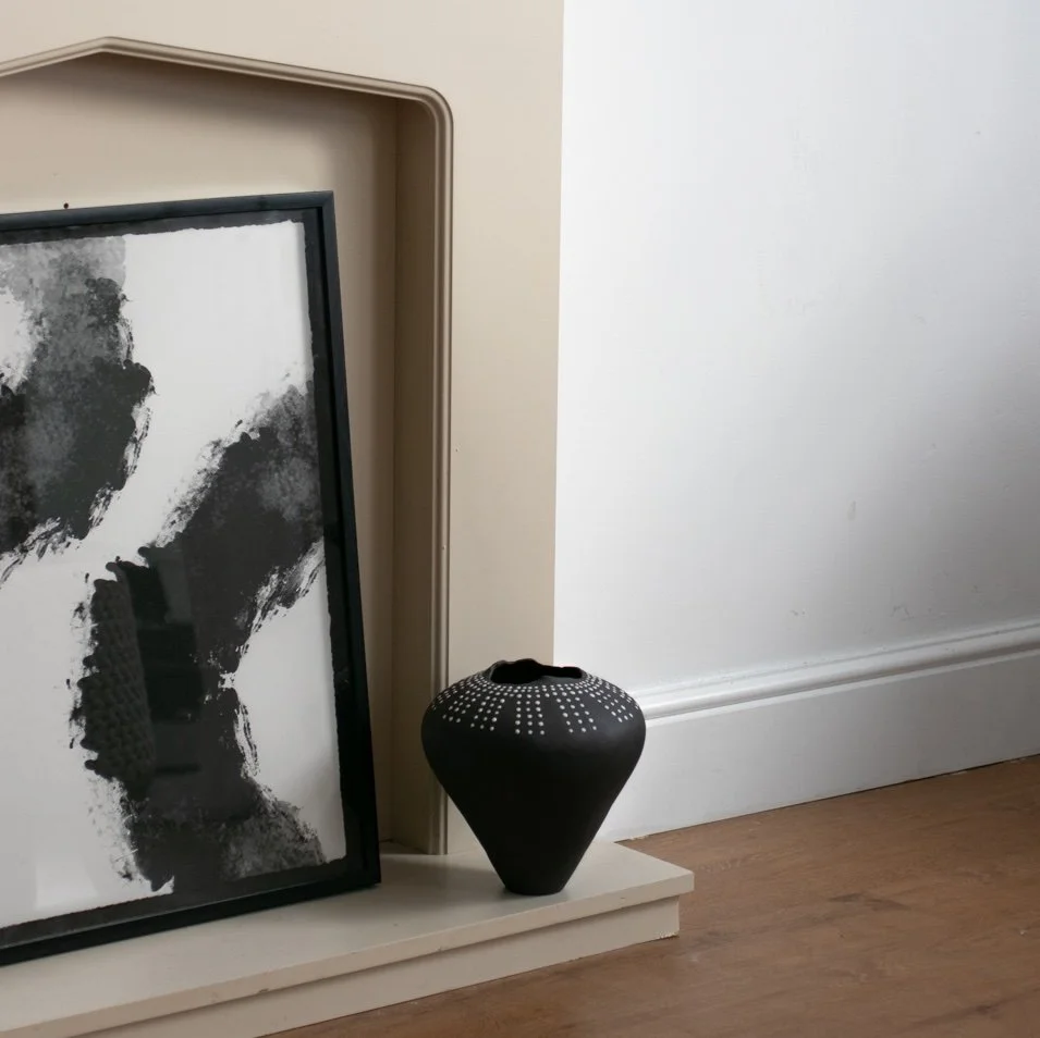 Torn fireplace hearth sq.jpg