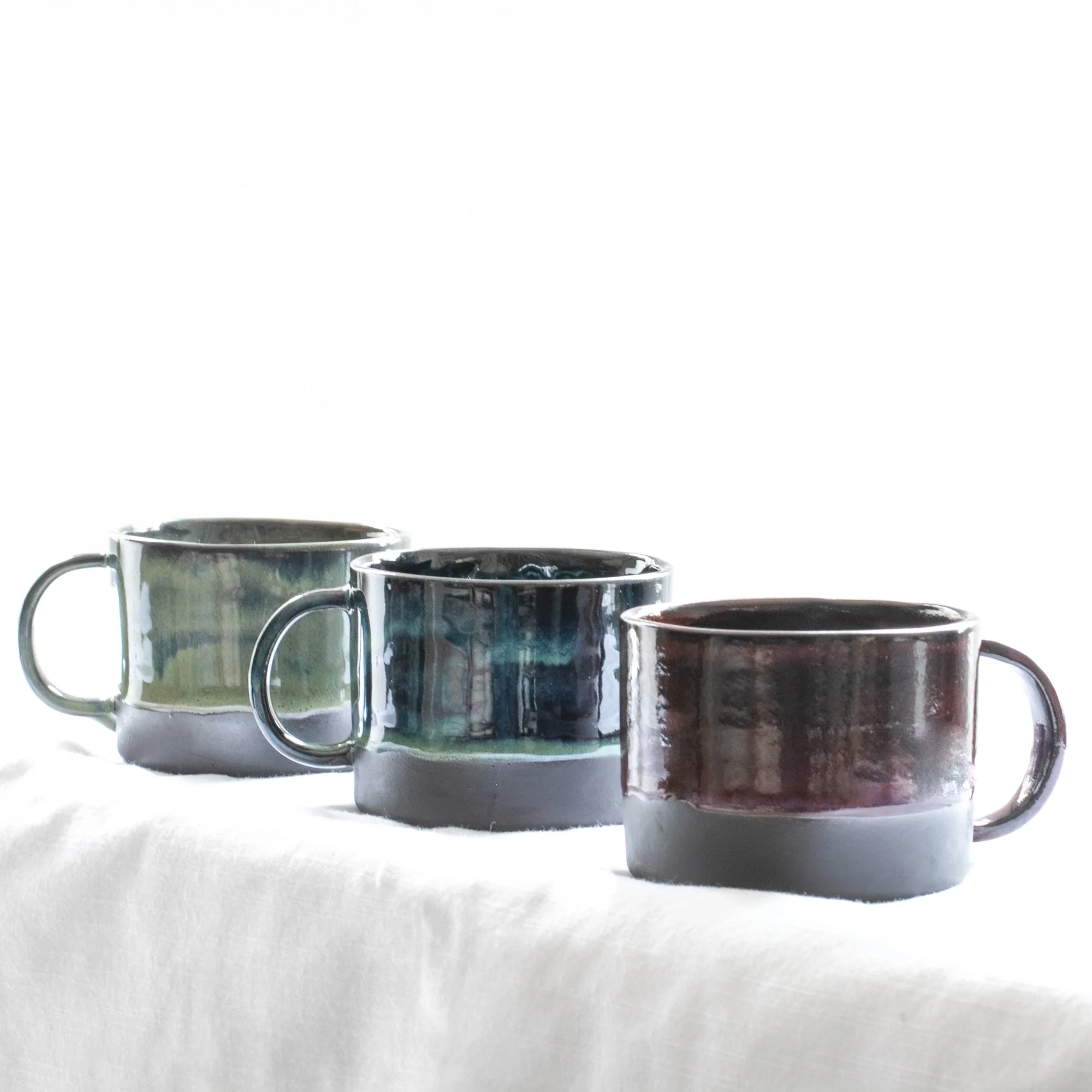 Mug storm blue green red light sq 144dpi.jpg